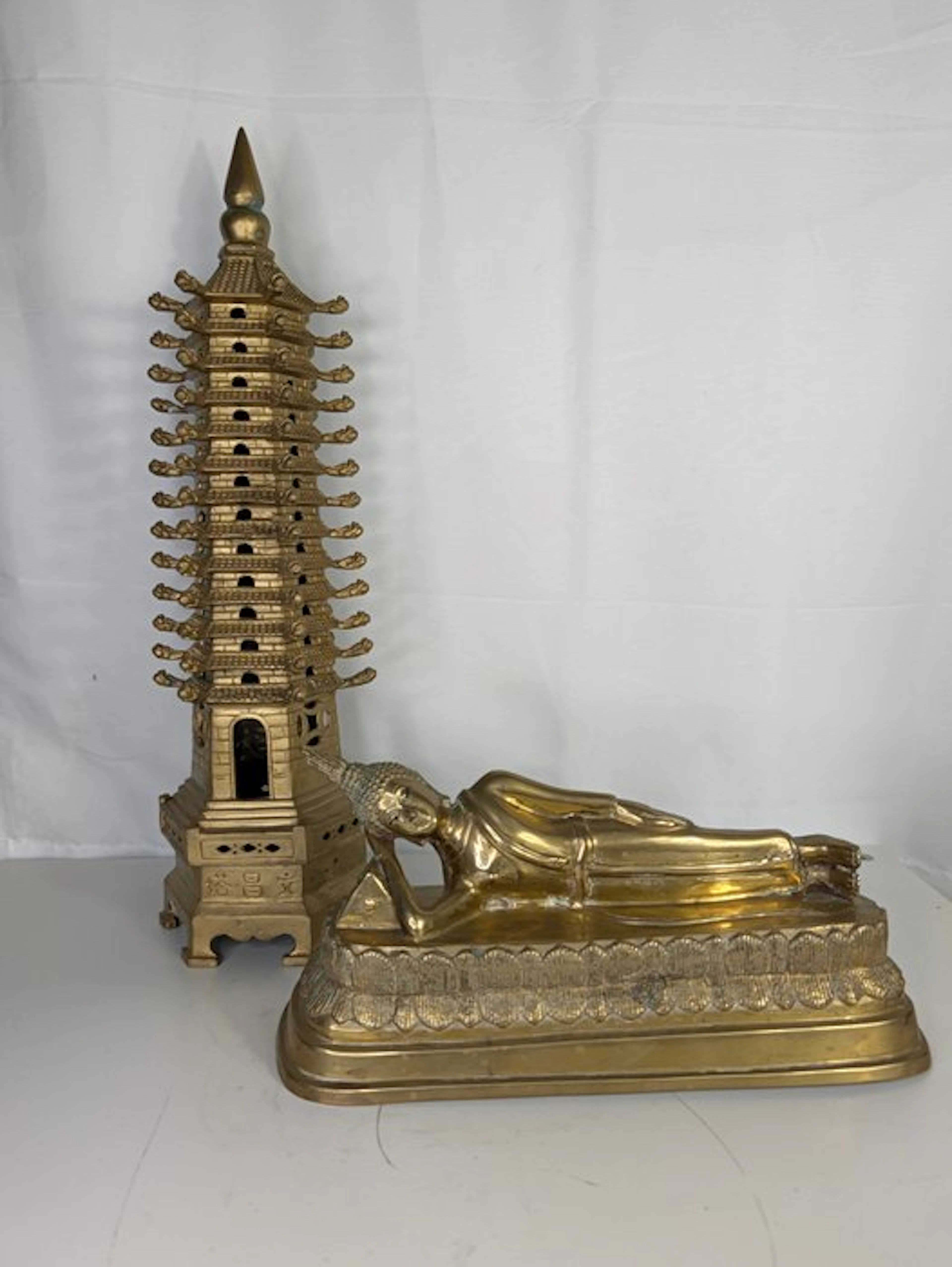 Bronze set: Reclining Buddha in Parinirvana & multi-story...