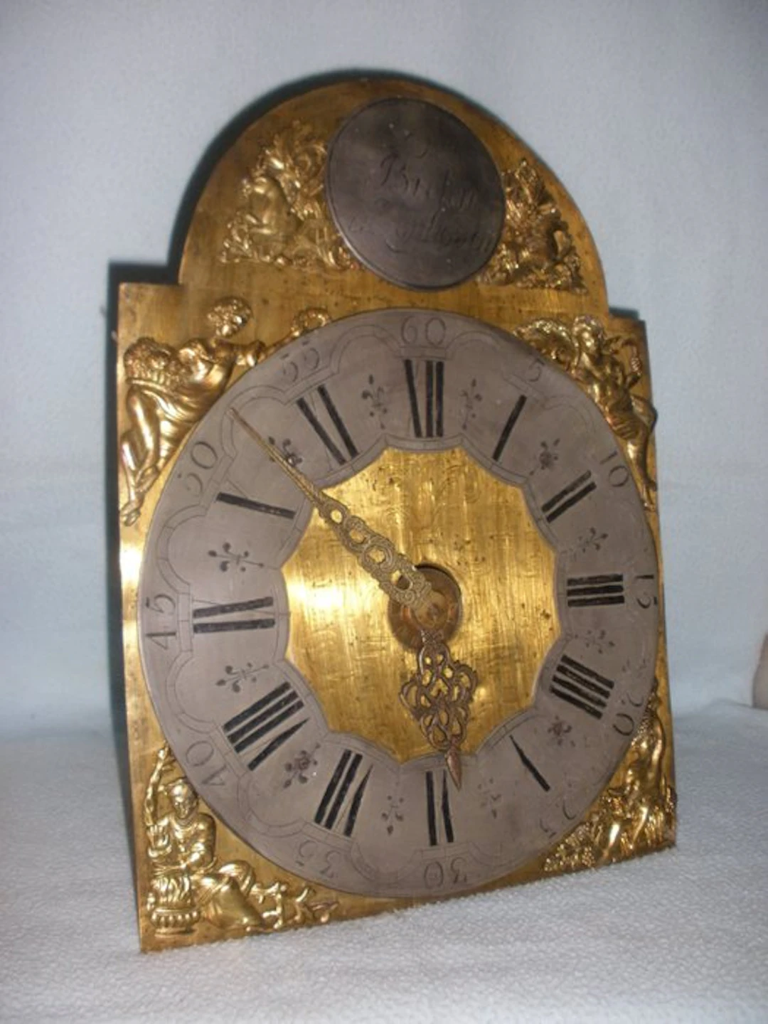 Gilded wall clock