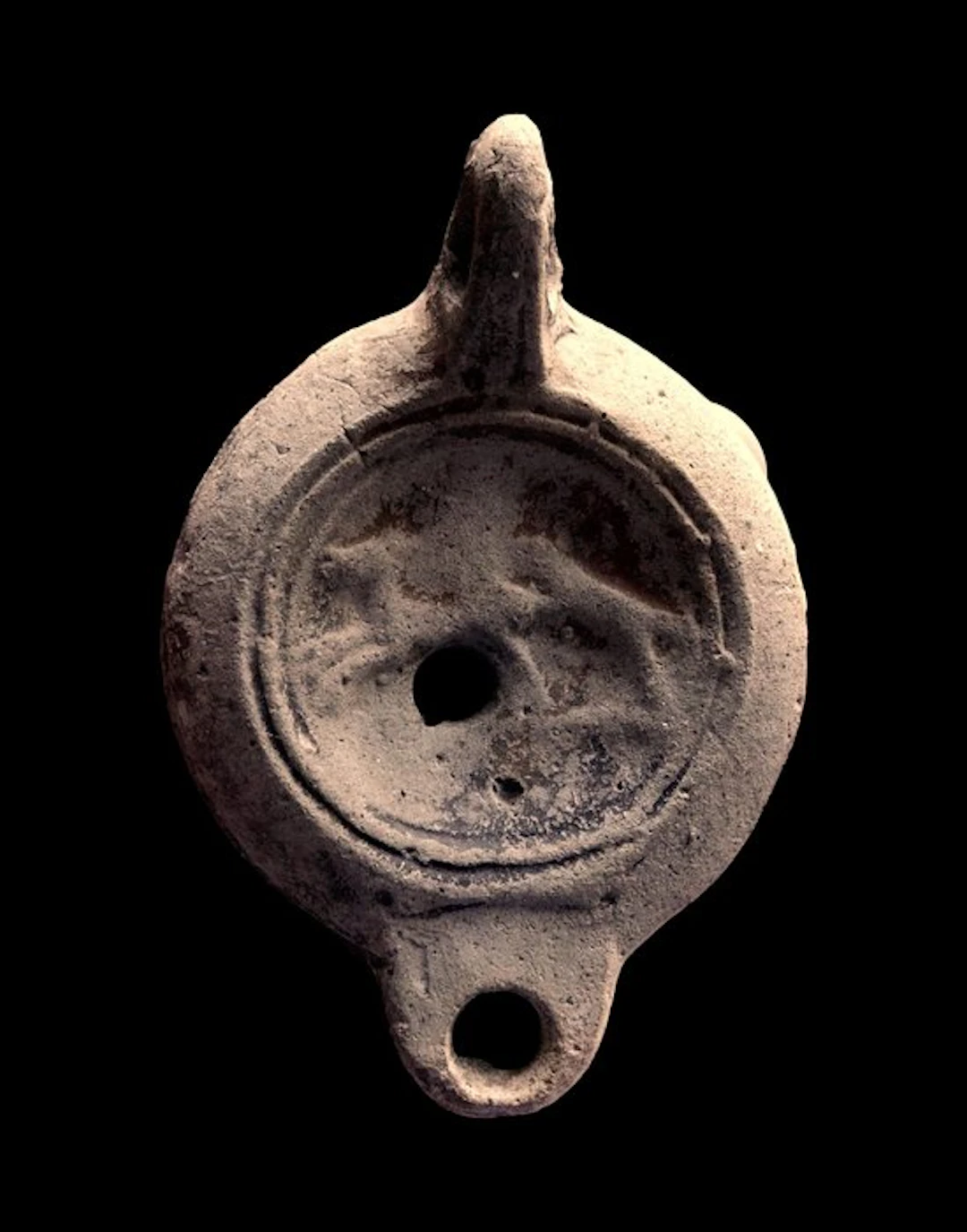 Ancient Roman - Oil lamp - bust of a young woman - potter's mark L MVN PHILE
