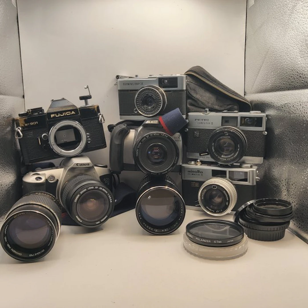 Canon, Olympus