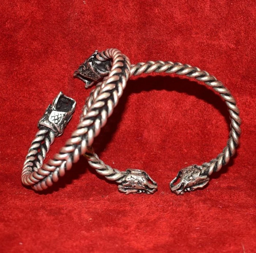 Pair of two dragon cuff bracelets