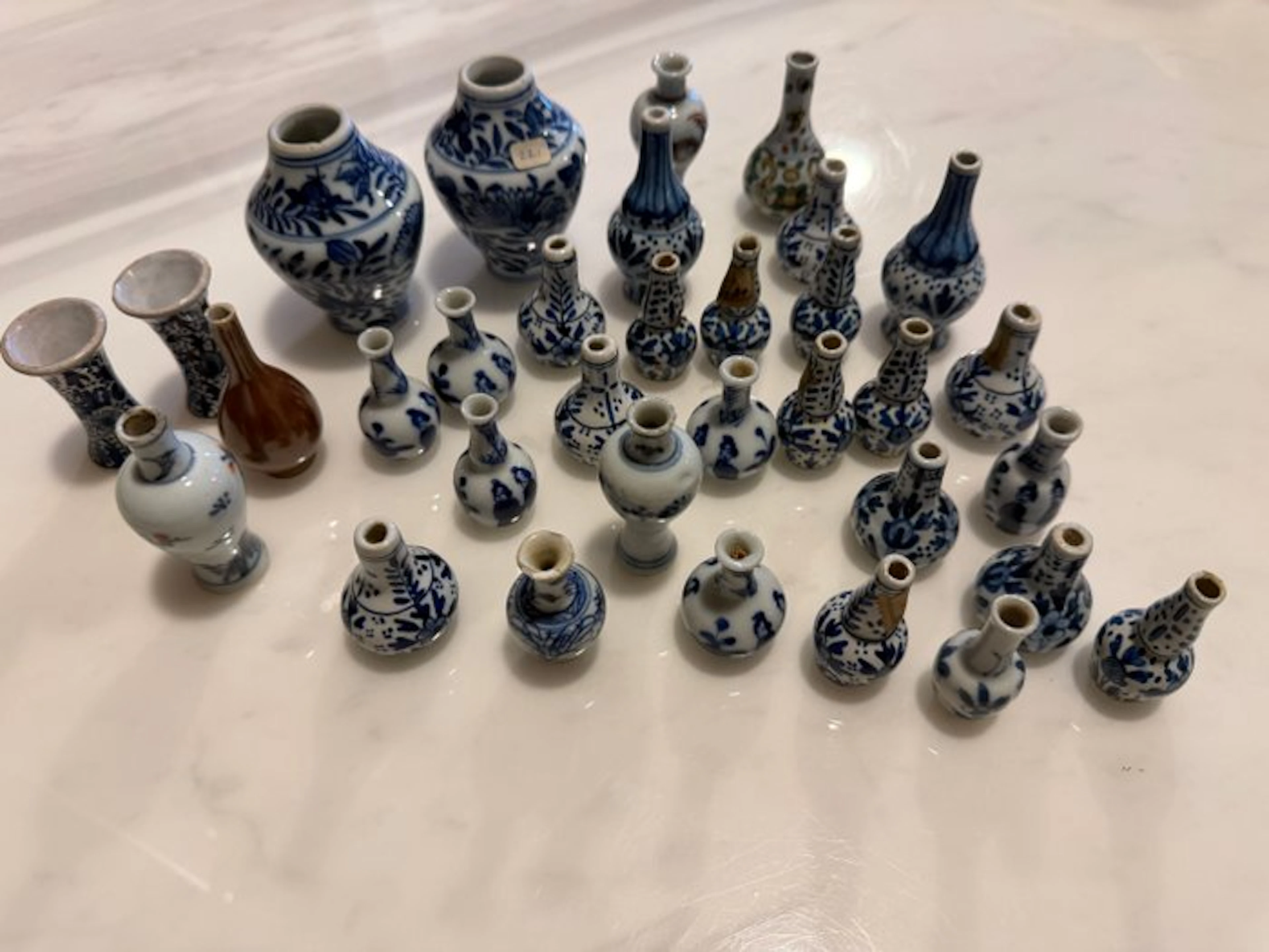 A Group of Thirty-Three Small Blue and White Porcelain Jars 19th–20th Century