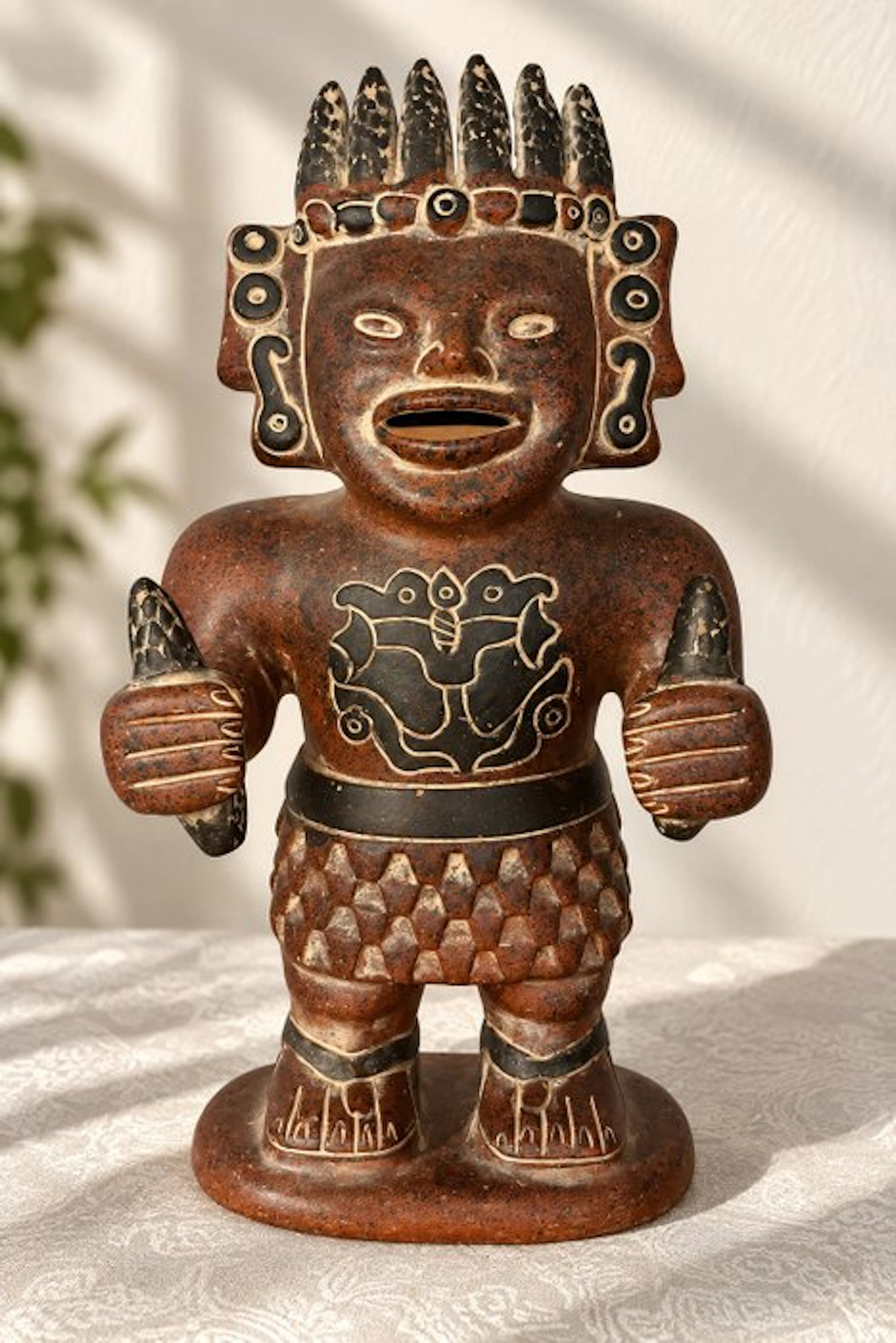 Mexican polychrome terracotta sculpture depicting an...