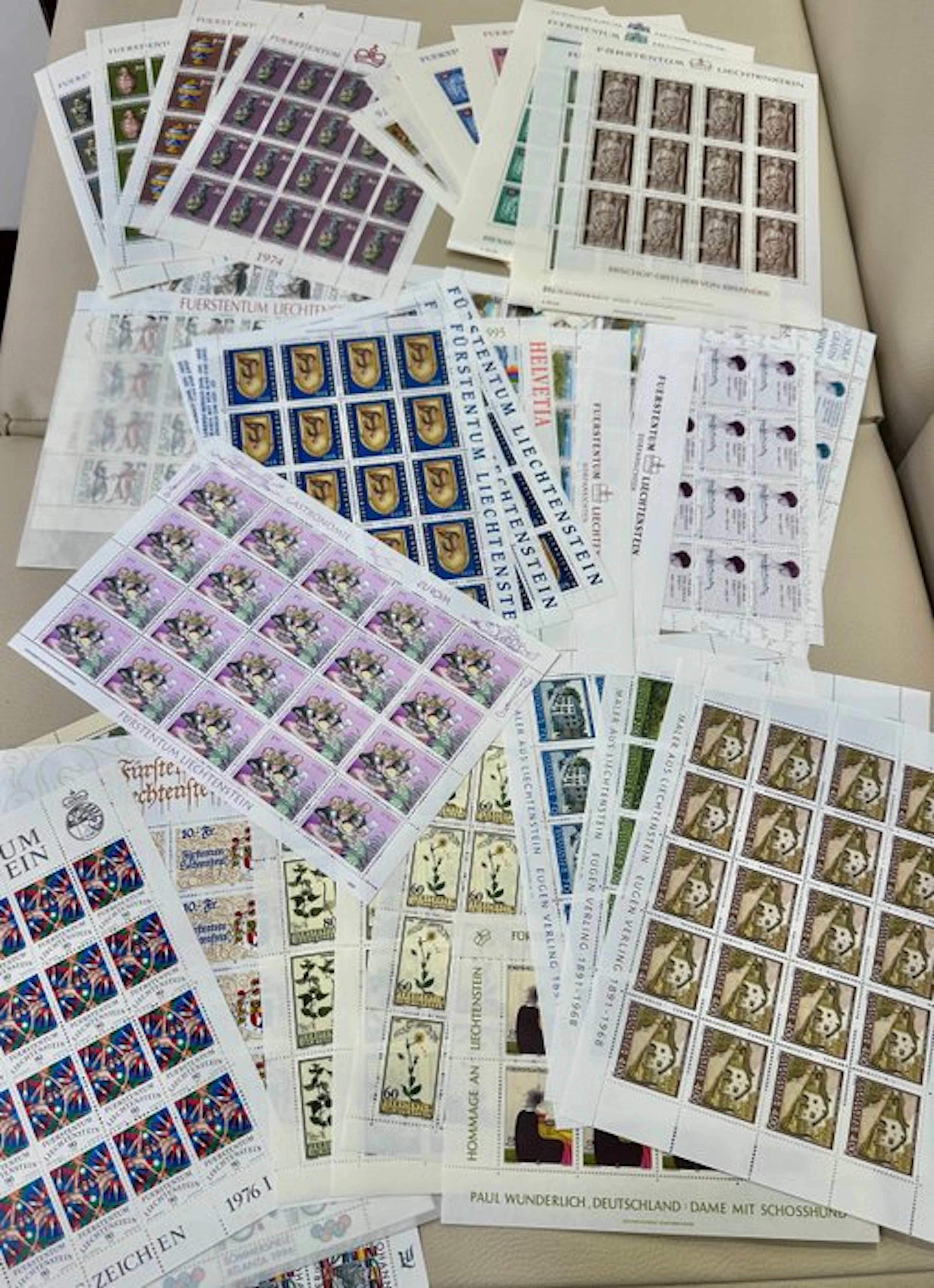 Liechtenstein - About 50 complete mini sheets of stamps from various