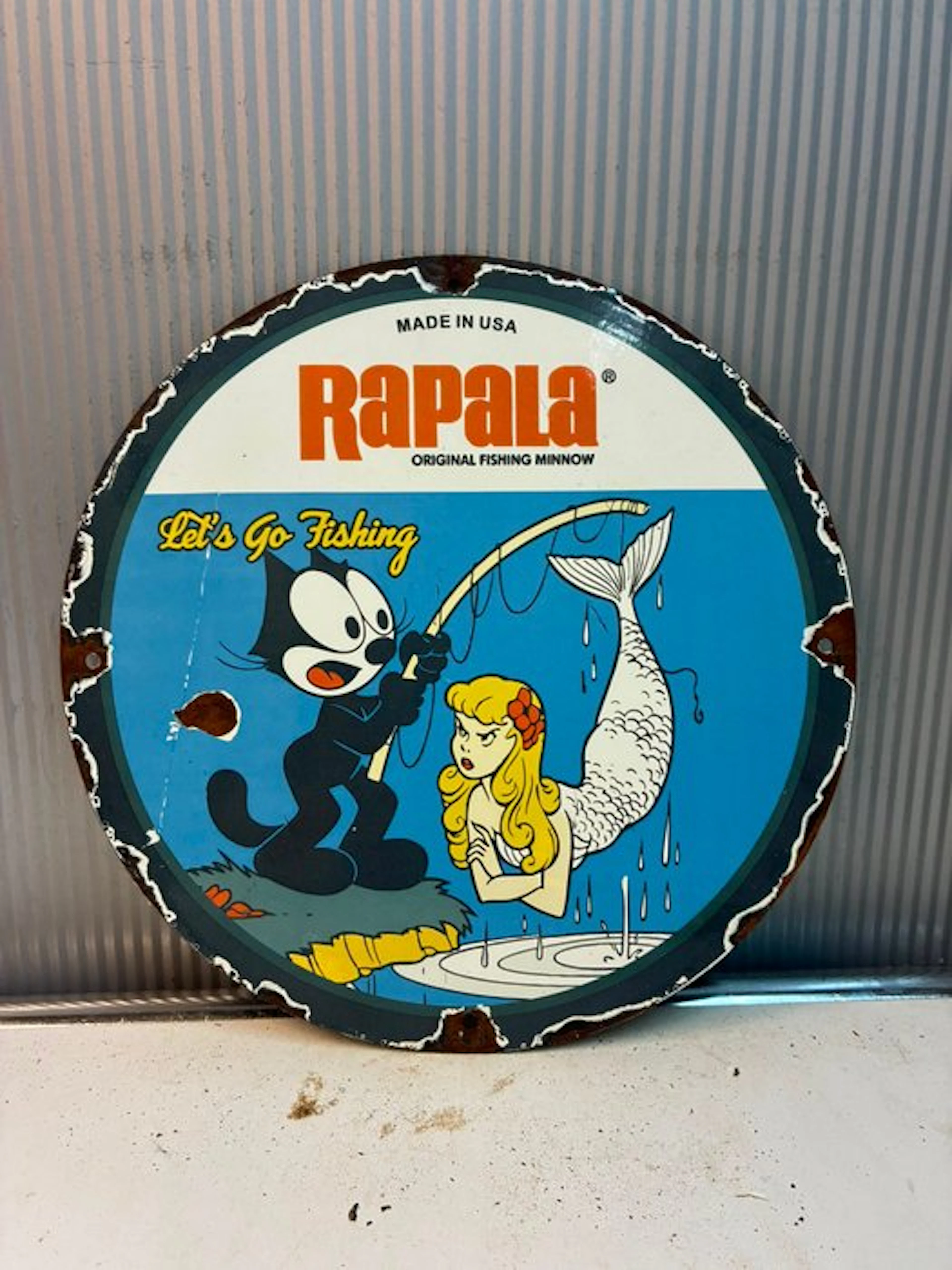Rapala ‘Let’s Go Fishing’ – rond geëmailleerd bord met...