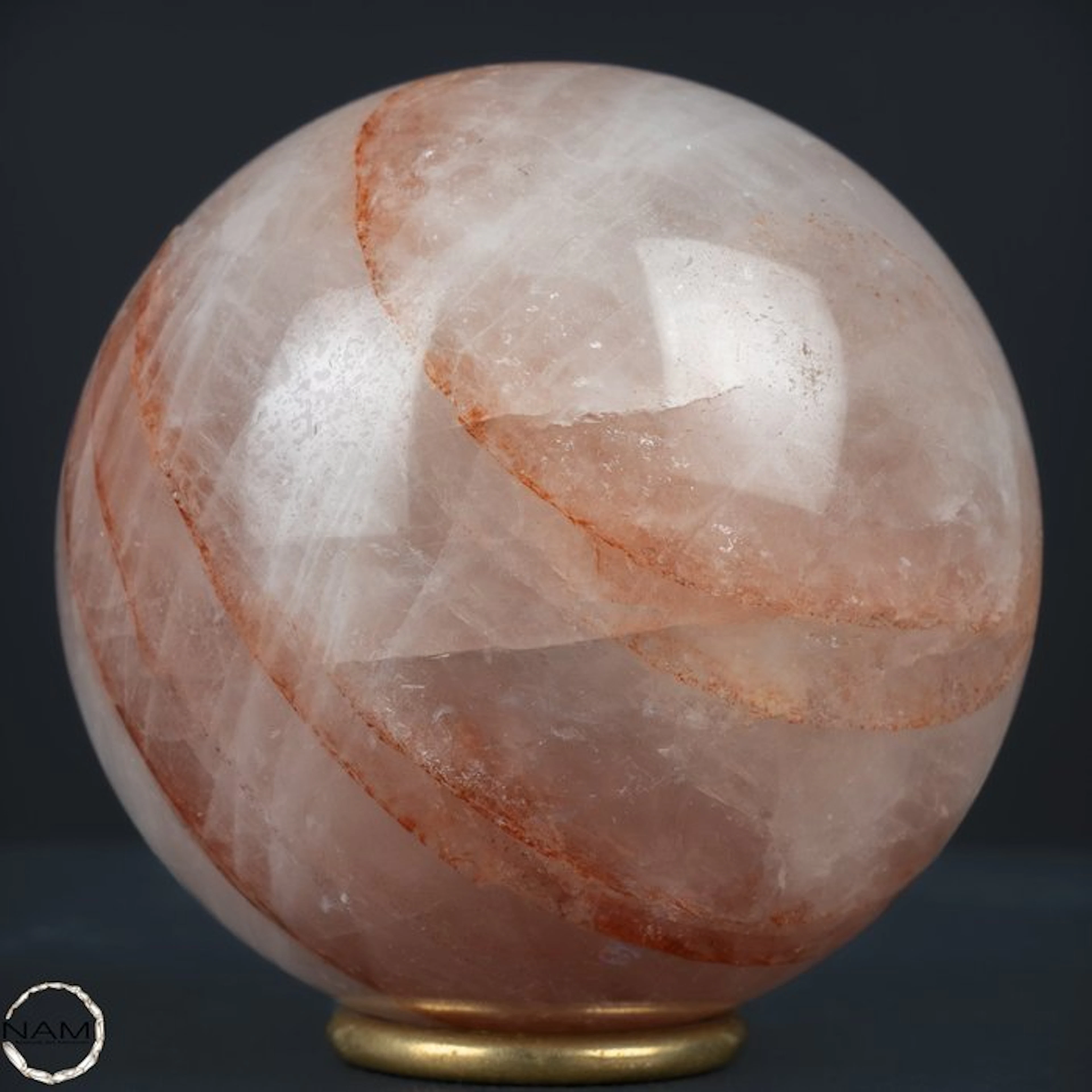 Breathtaking fire quartz sphere – fascinating red mineral veins