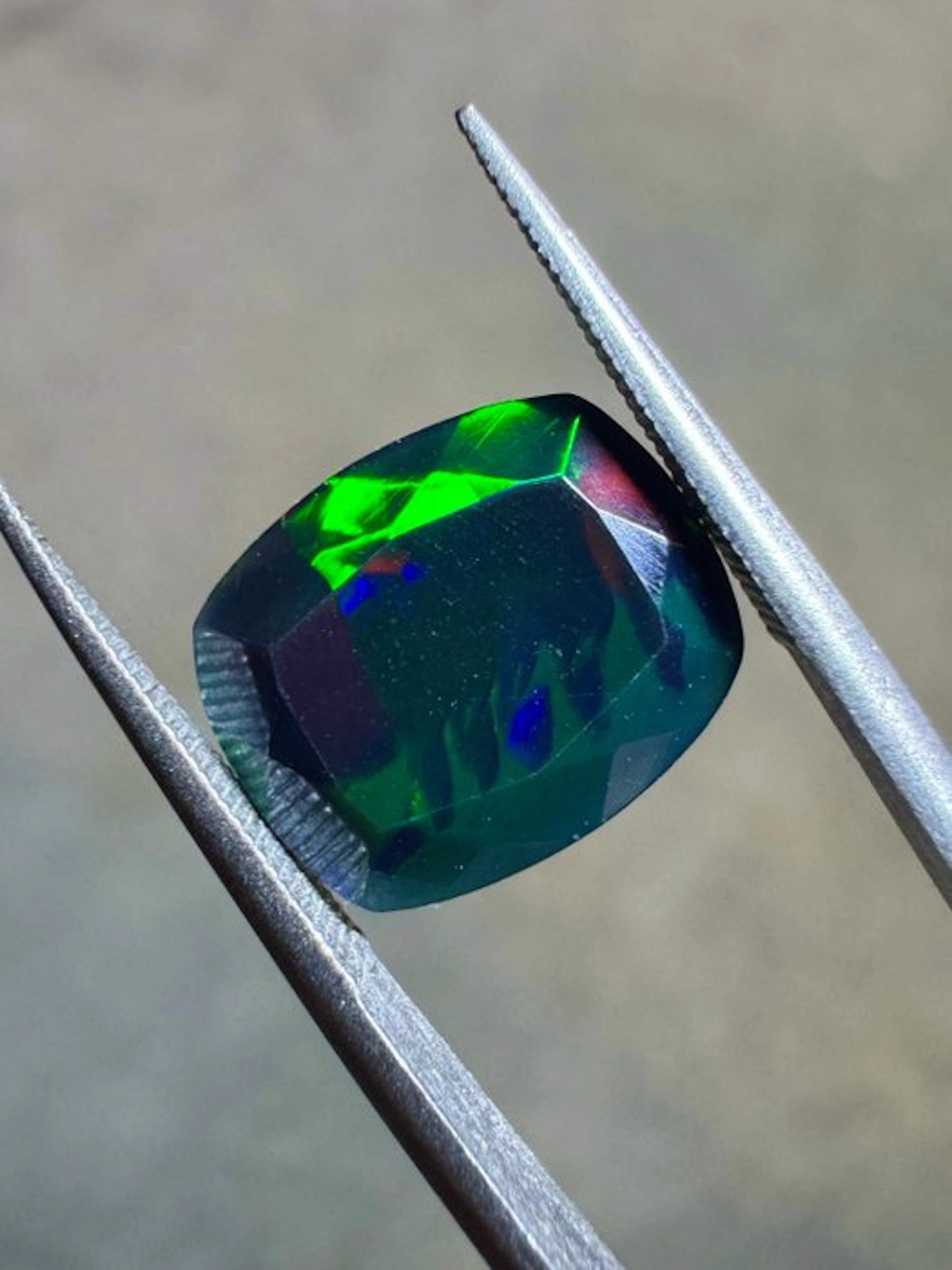 TOP QUALITY!!! Faceted Ethiopian black opal - 2.75 carats...