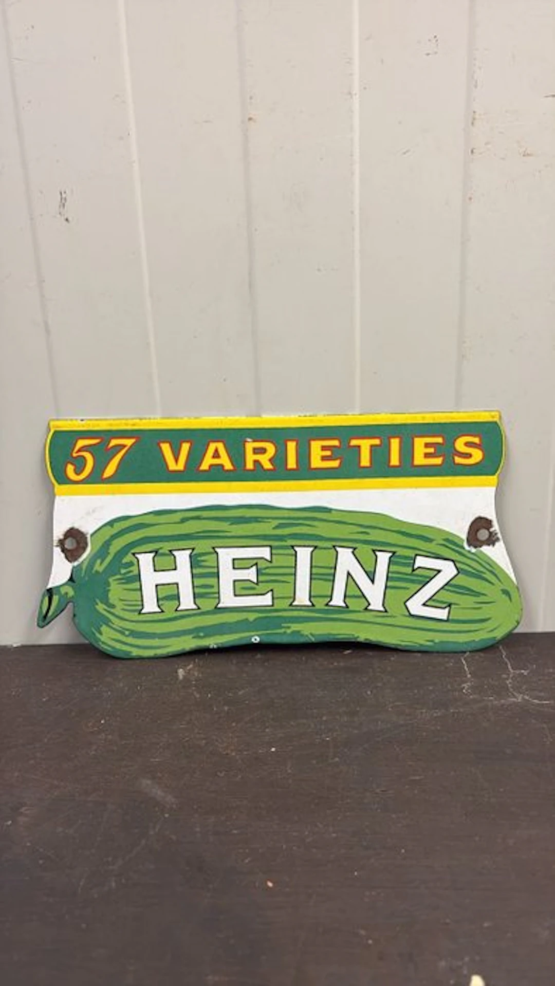Vintage Heinz '57 Varieties' advertising sign – cucumber-shaped