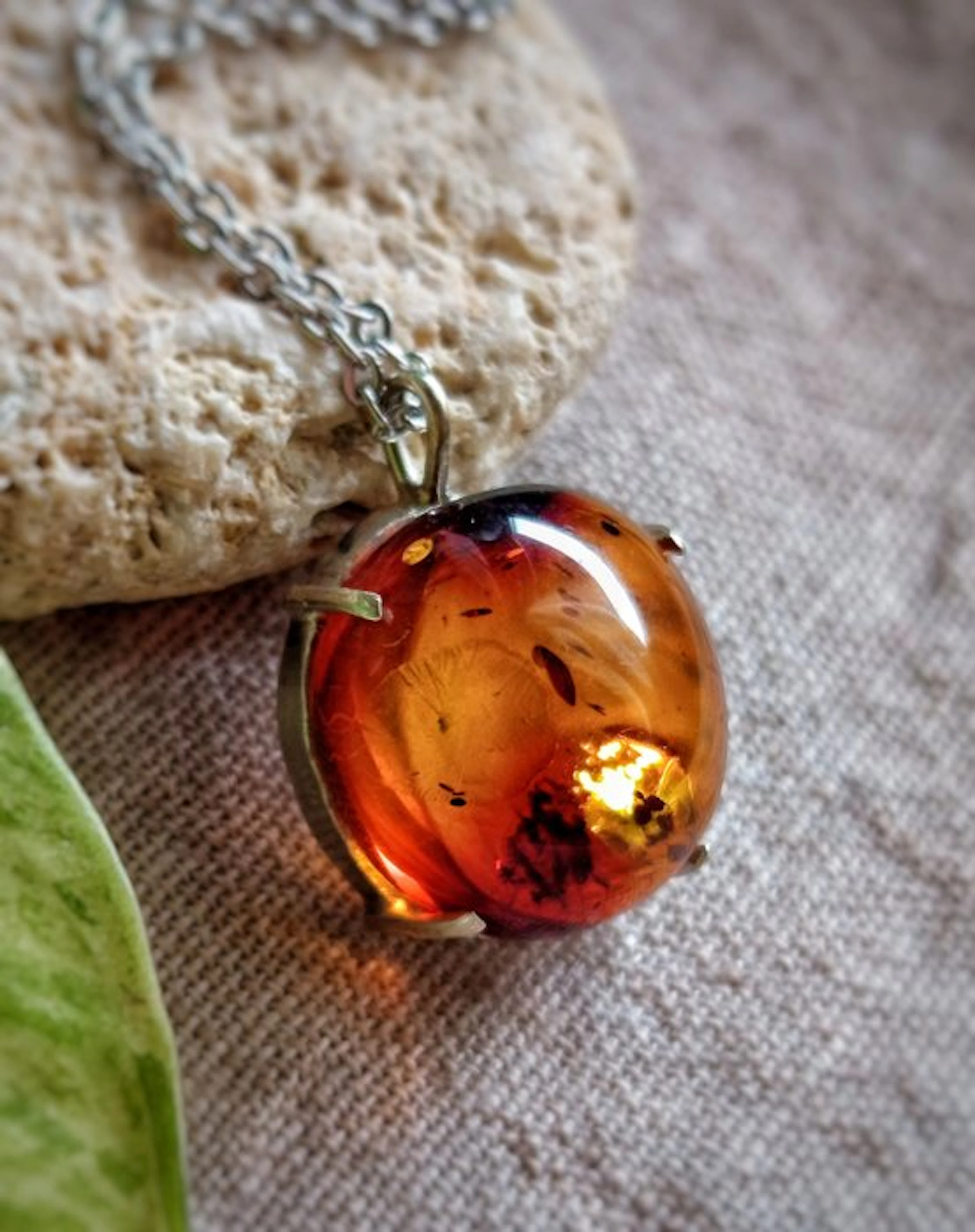 Handcrafted 'Fire' jewelry in 925 silver with Baltic amber