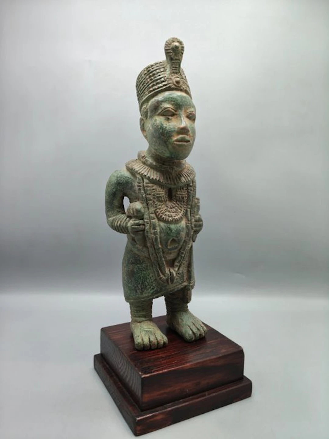 A superb statue of the Oba in war attire