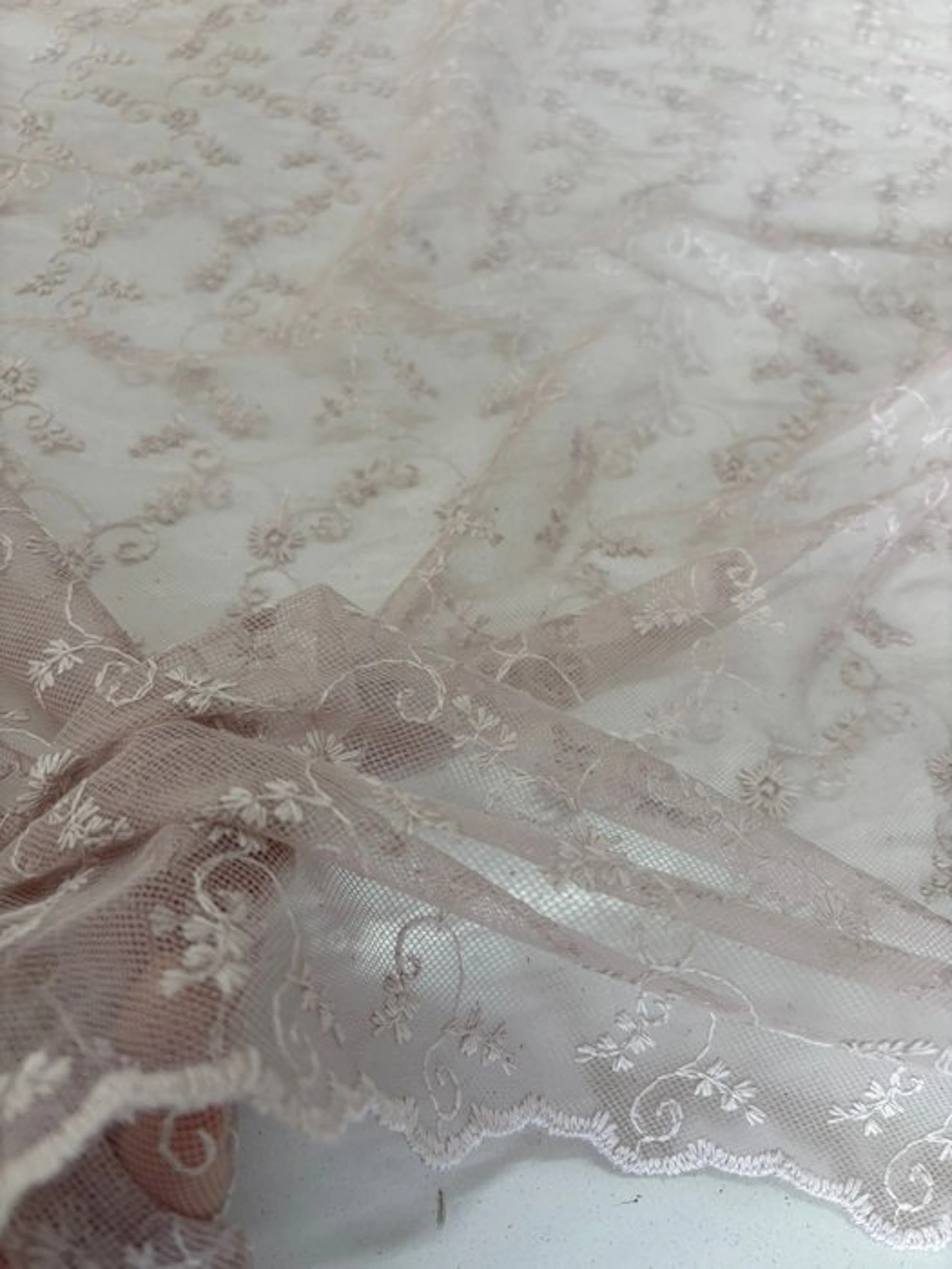 Precious drapery fabric: French-embroidered tulle