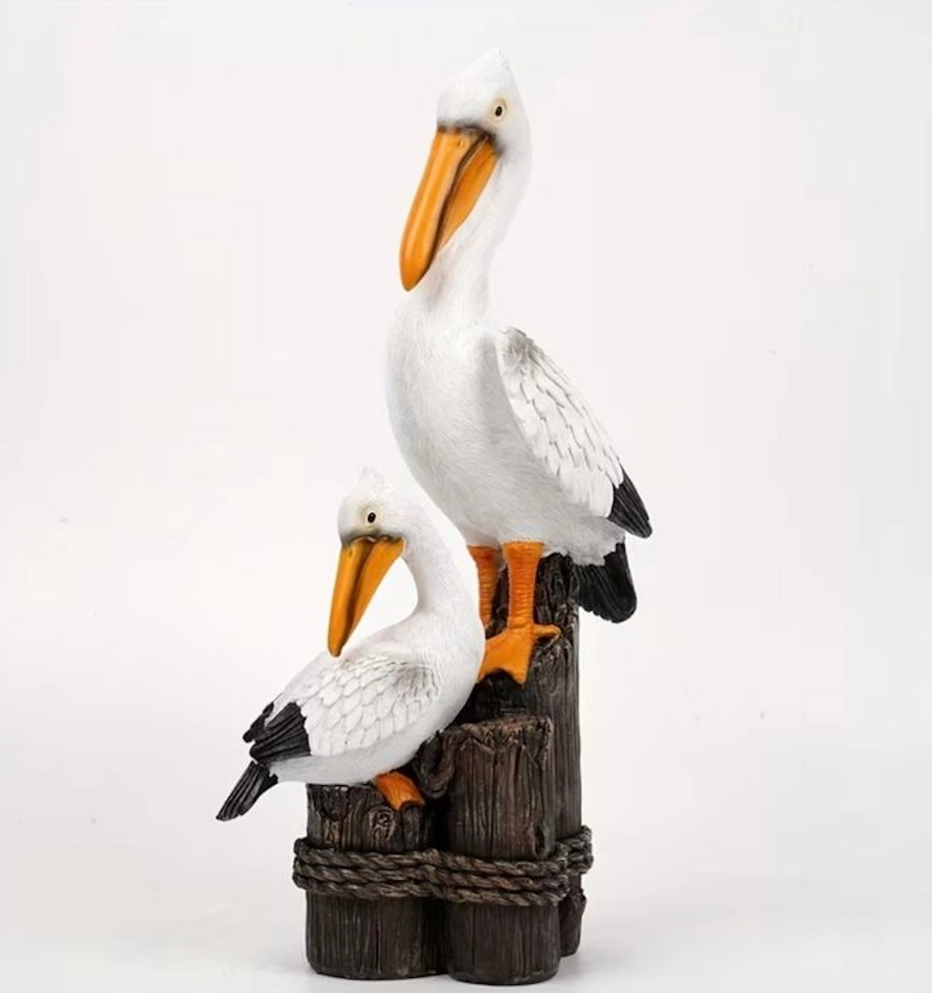 Unknown - Figure - Pair of pelicans on wooden posts - Resin