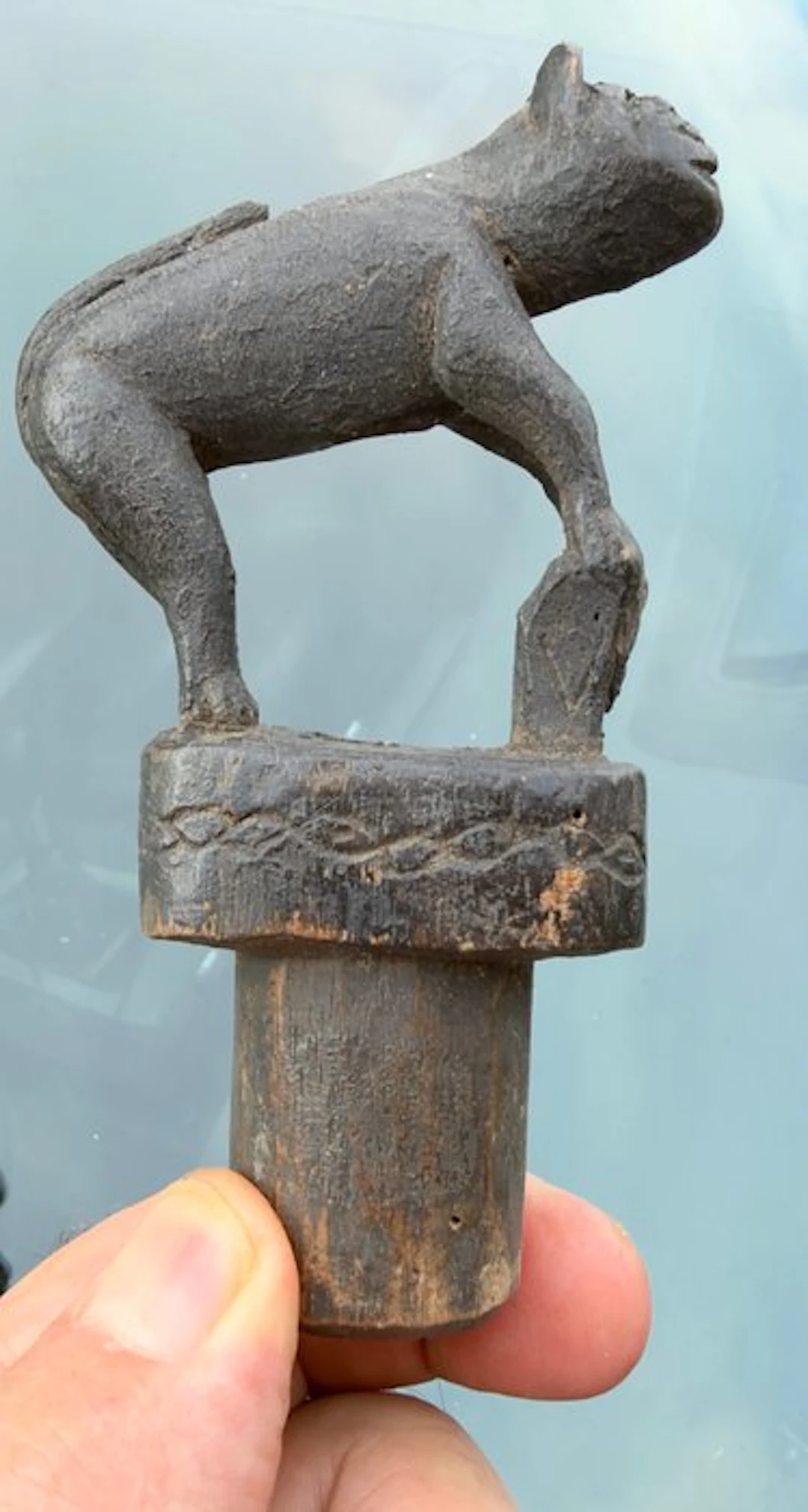 Wooden mythical animal asa cover for medicin pot Sumbawa isl