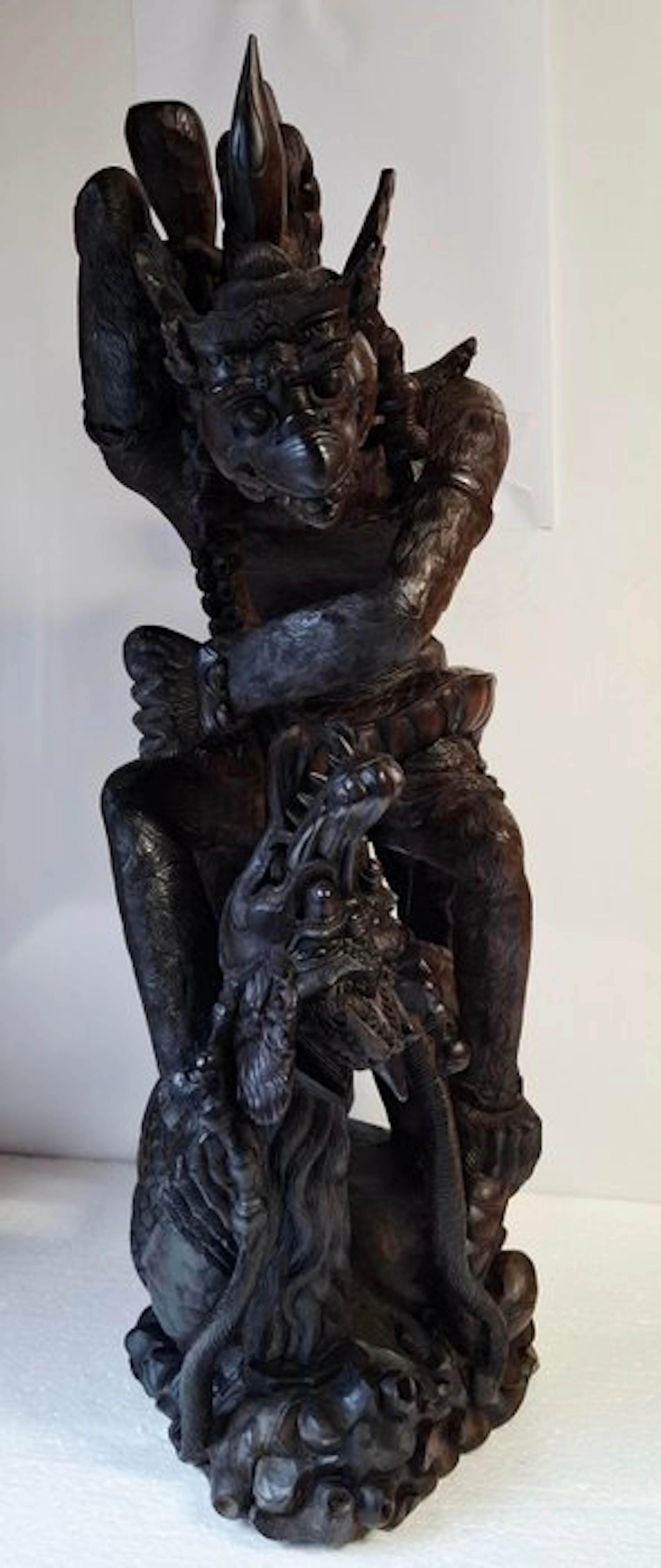 the monkey-warrior Hanuman in battle with the Naga...