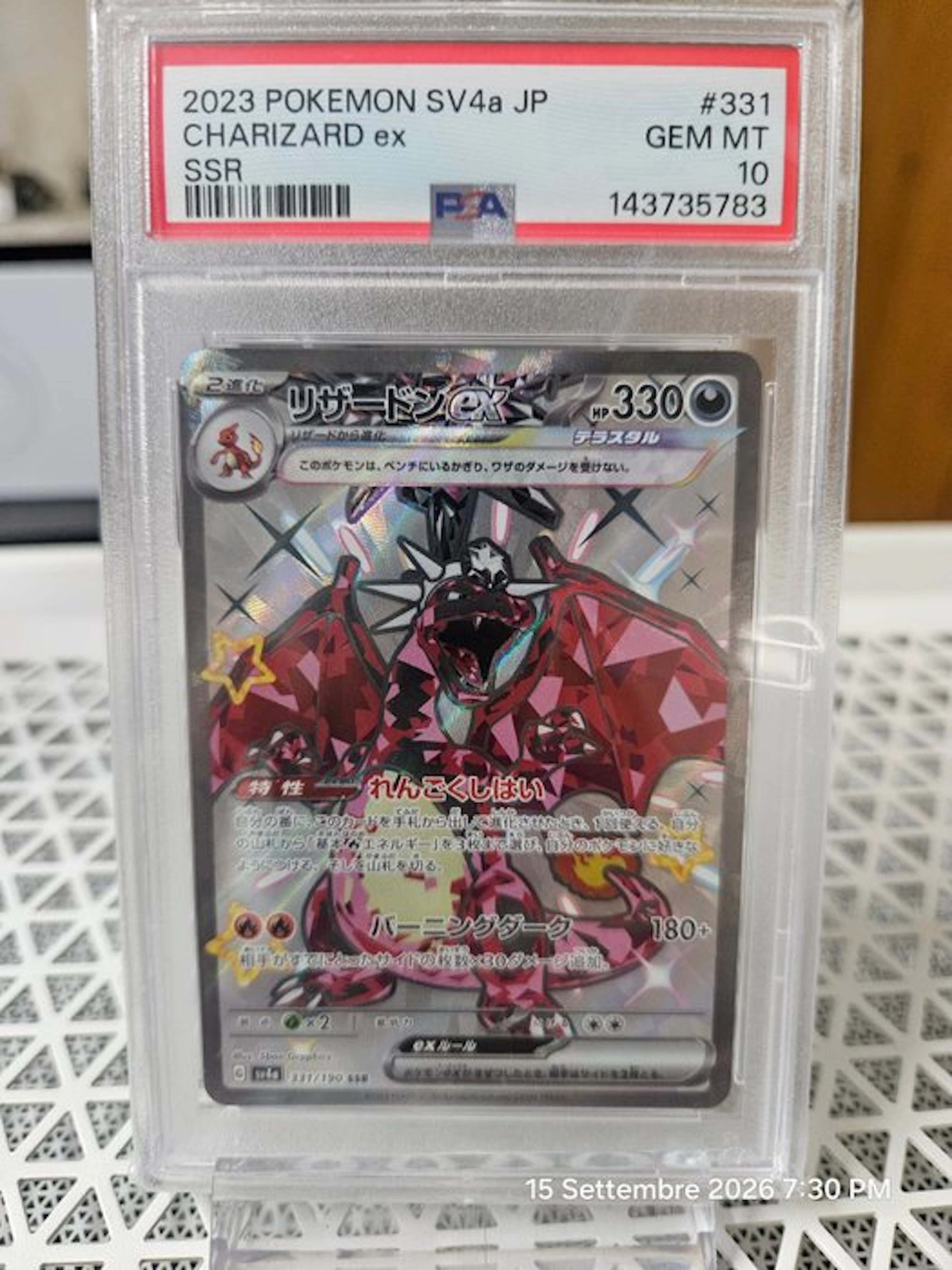 Pokémon - 1 Graded card - Charizard 331/190 Secret rare