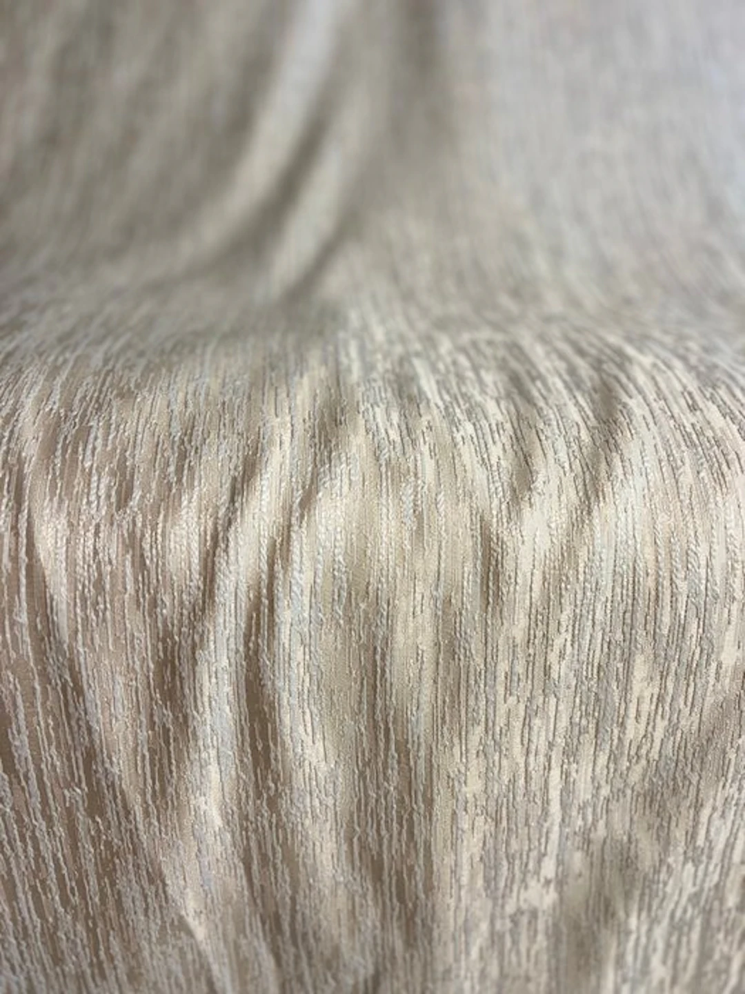 Textured jacquard fabric with a vein-like effect in sand and champagne tones