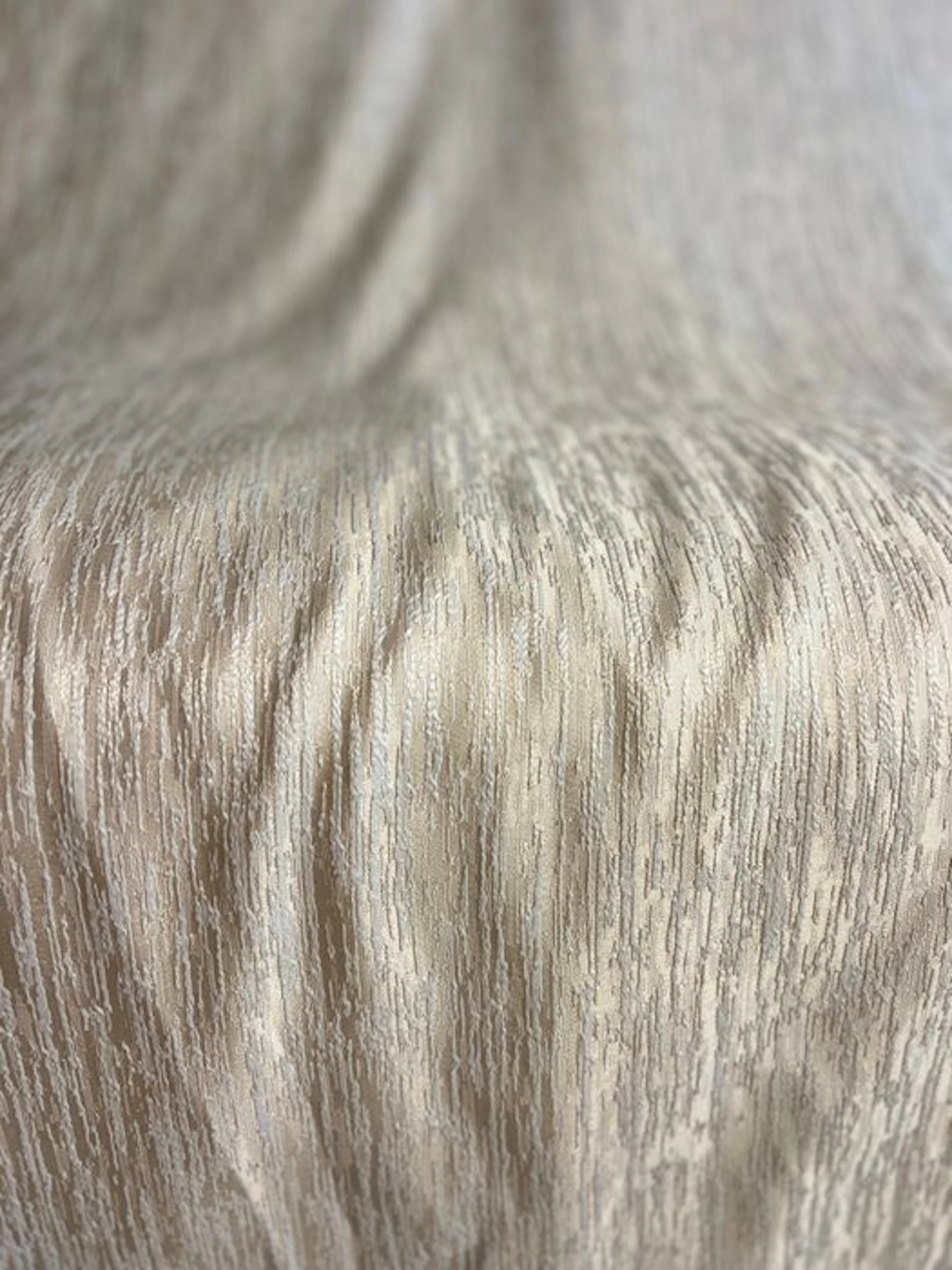 Textured jacquard fabric with a vein-like effect in sand and champagne tones