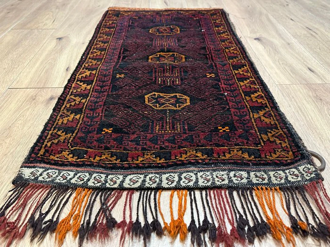 Hand-knotted Belutsch rug – geometric medallions...