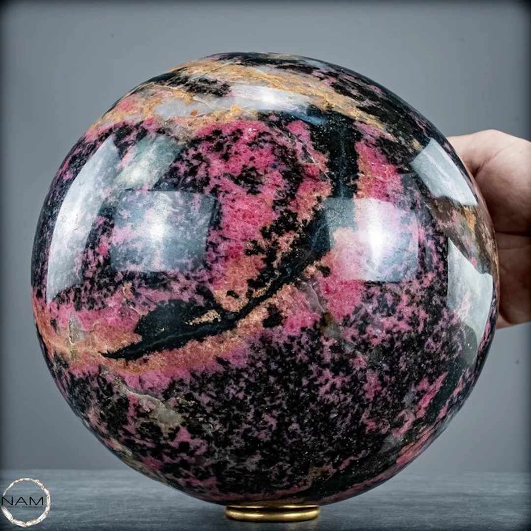 Natural rhodonite sphere of the highest quality- 14404.41 g