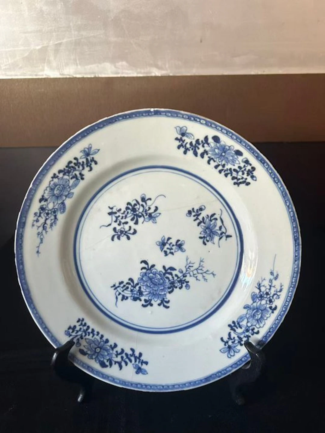 Blue and white porcelain plate with a floral pattern