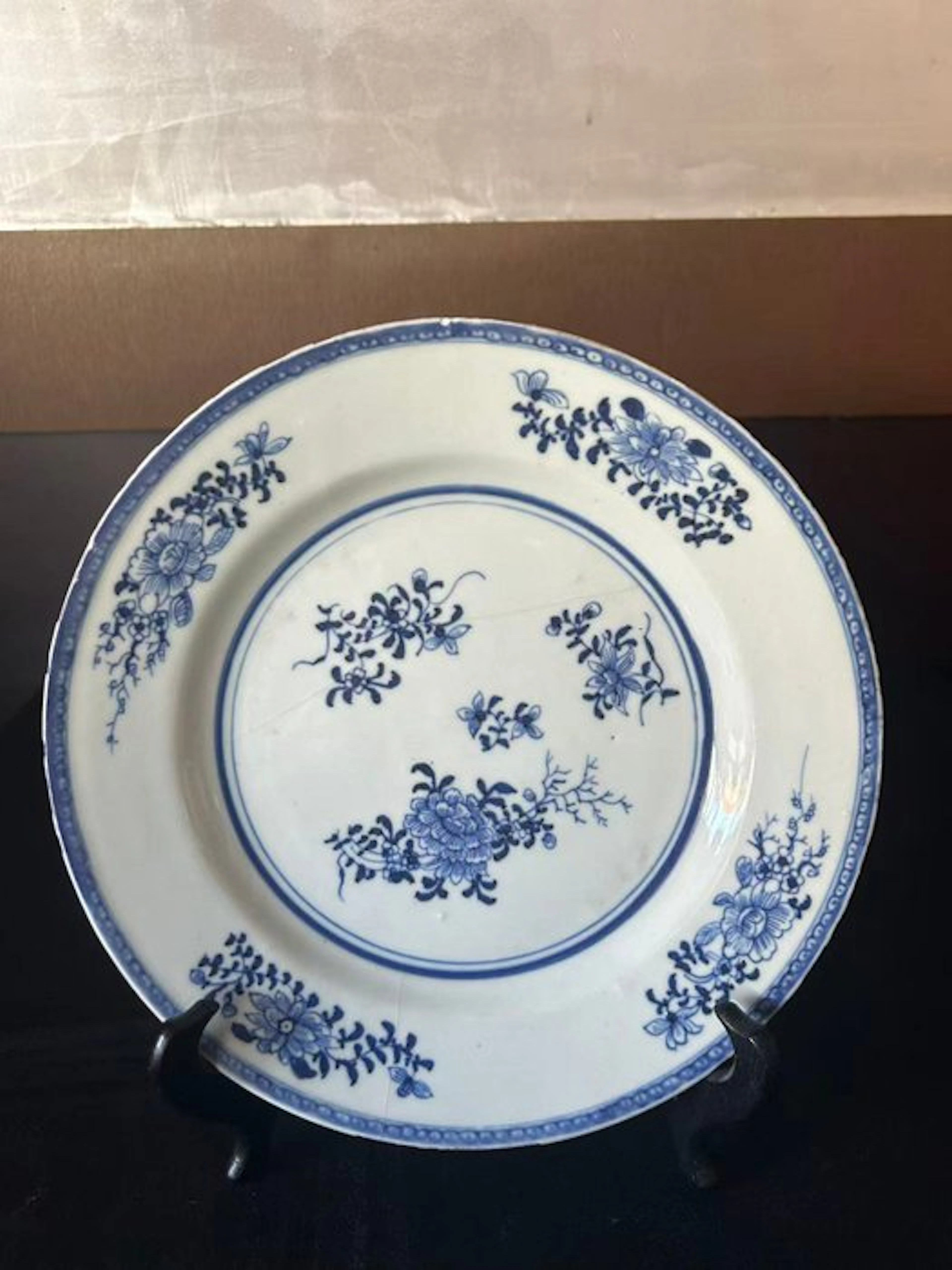 Blue and white porcelain plate with a floral pattern