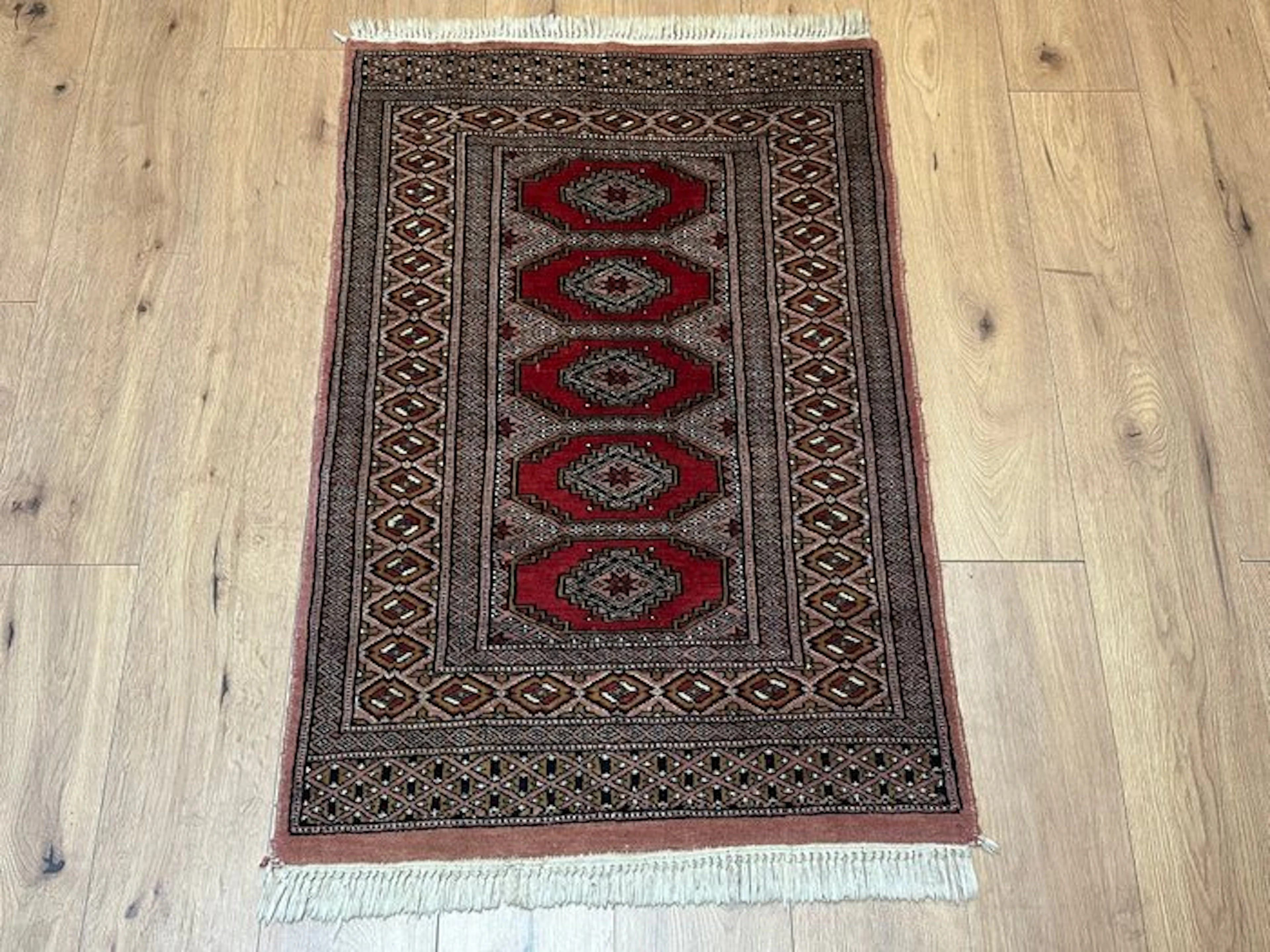 Exquisite Oriental rug in the classic Bukhara style with characteristic