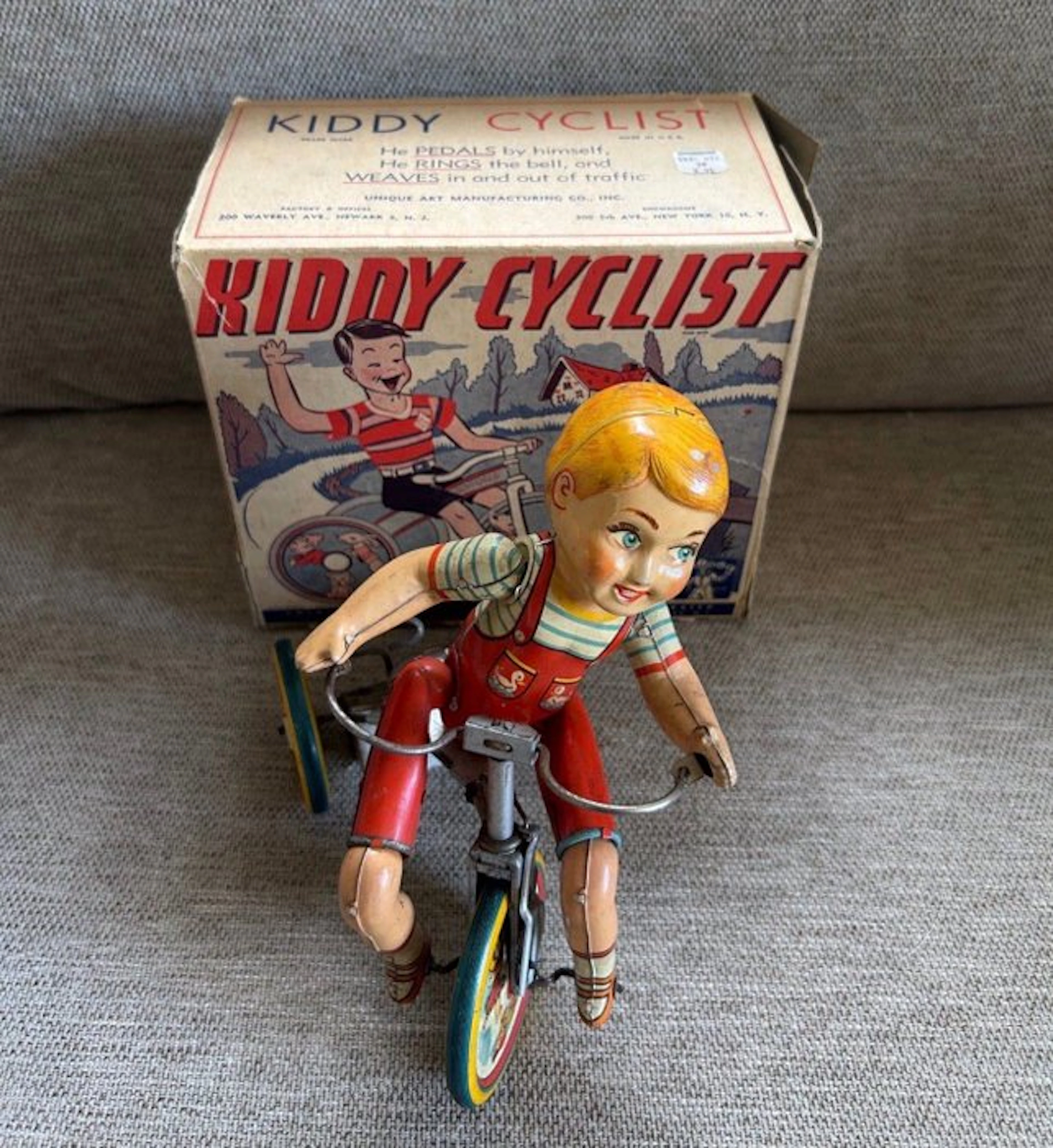 Unique Art - Rare Antique Unique Art "Kiddy Cyclist" Tin...