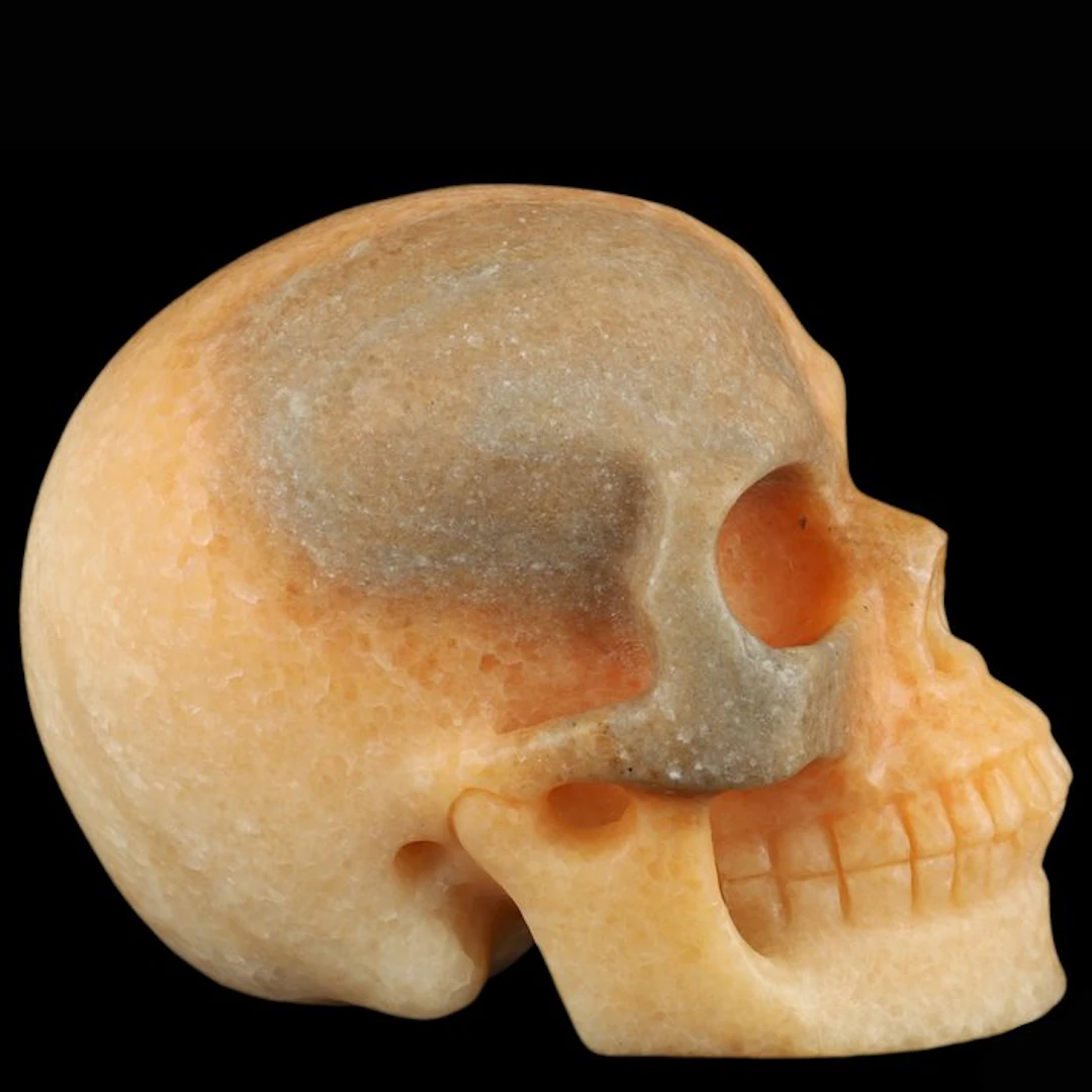 1.34 kg orange calcite skull – Sun Wukong