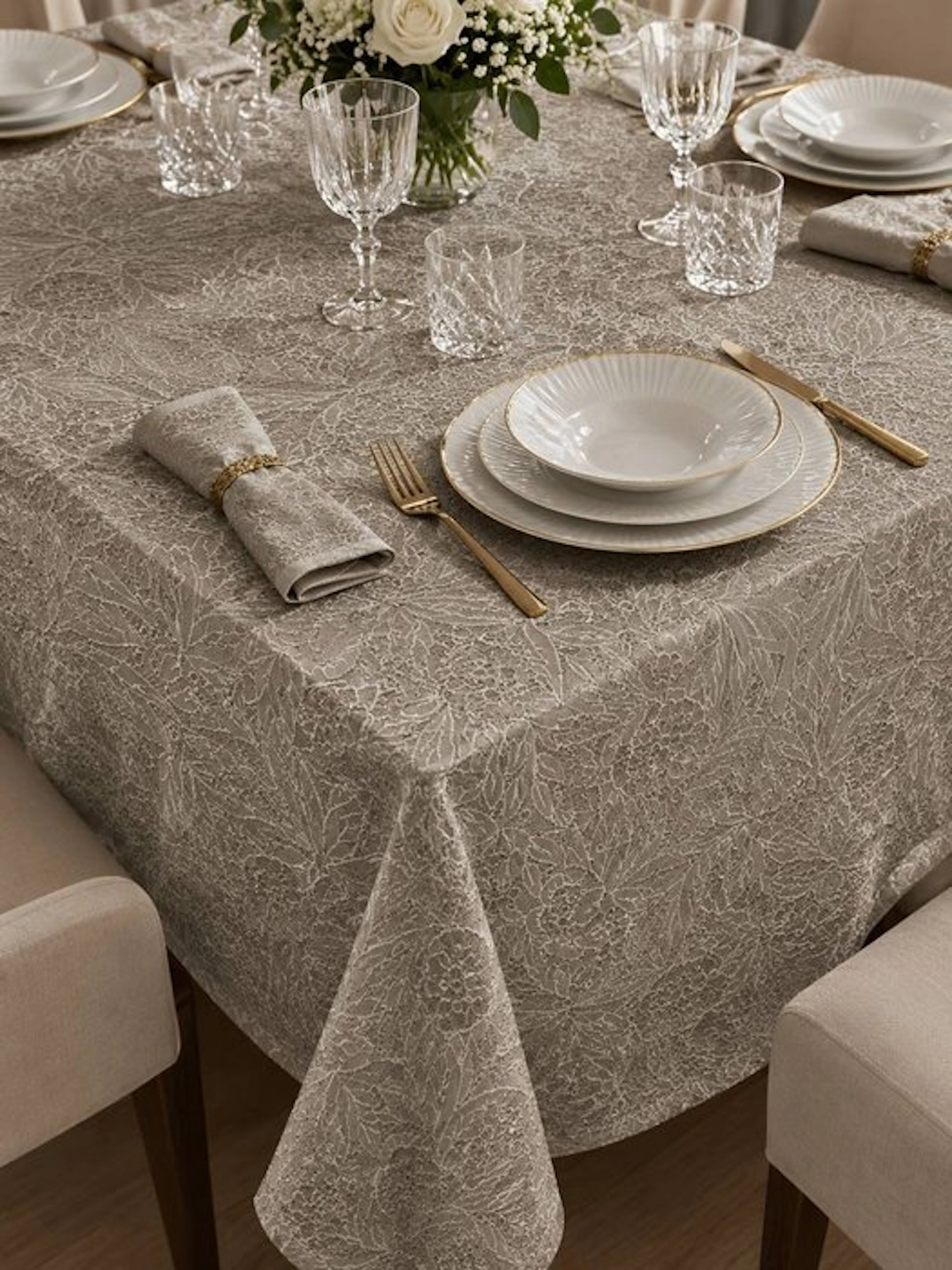 Tablecloth with floral embroidery and macramé carving detail