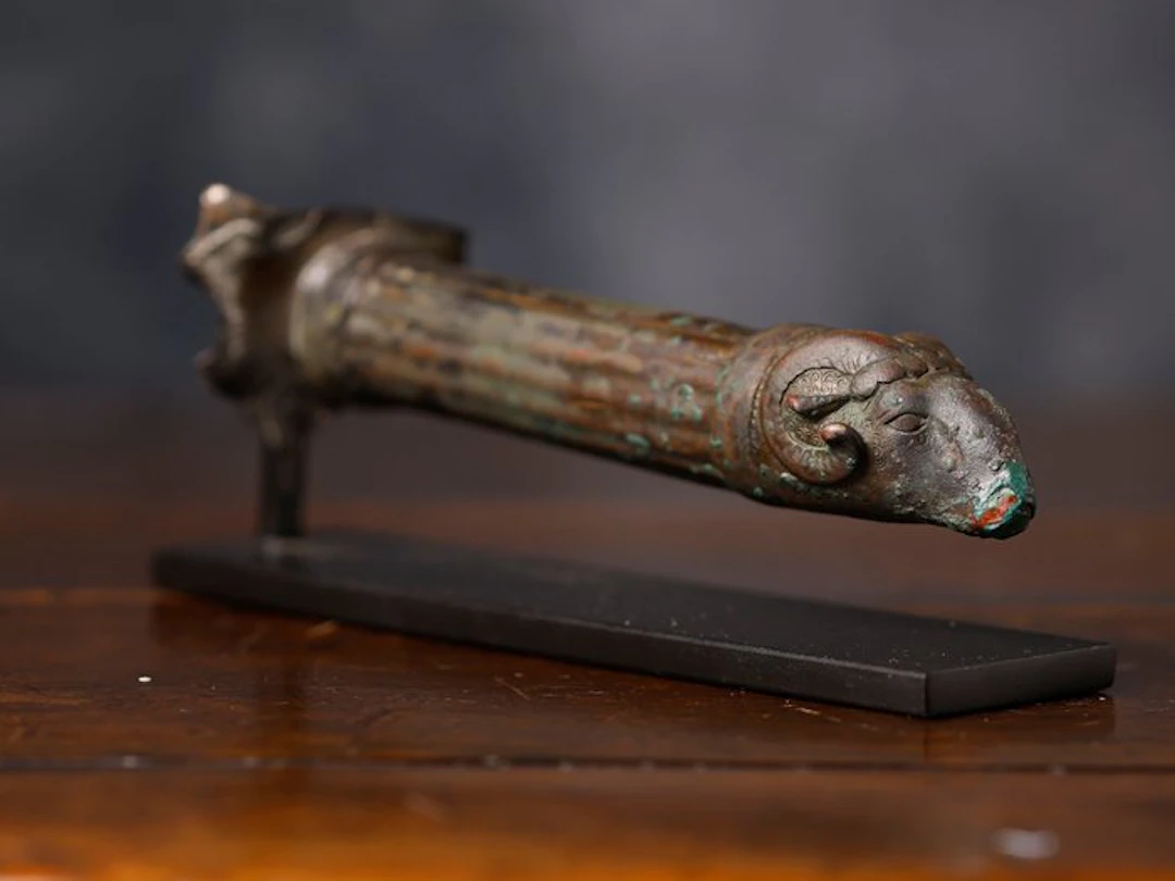 Roman bronze handle with ram's head terminal