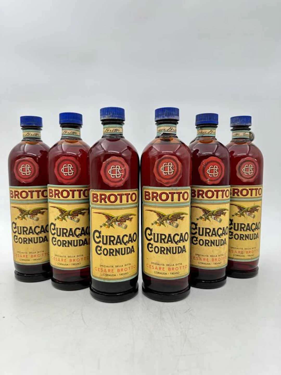 Brotto - Curaçao Cornuda - b. 1950s - 50cl - 6 bottles