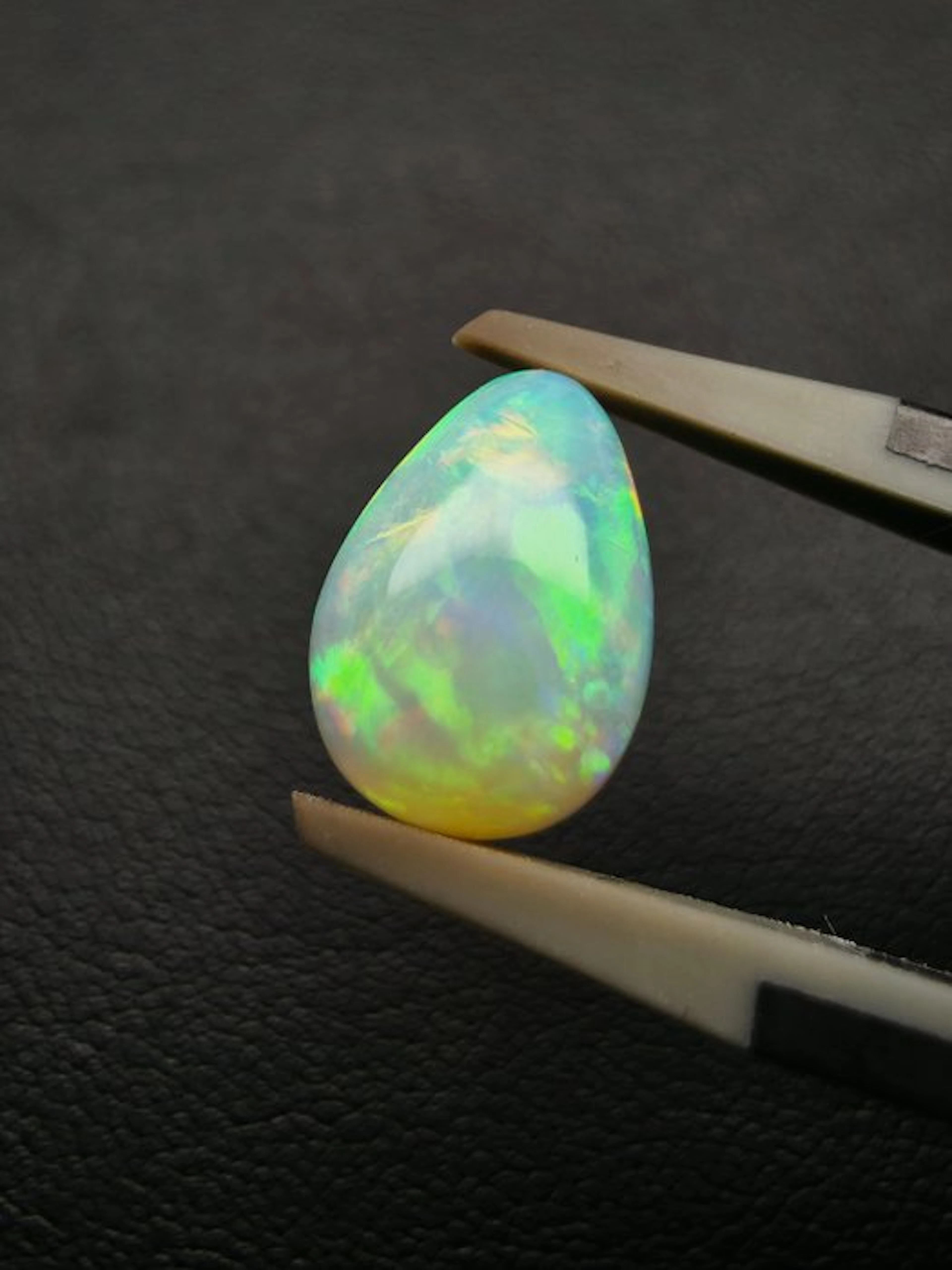2.4 cts White Opal Cabochon- 0.48 g