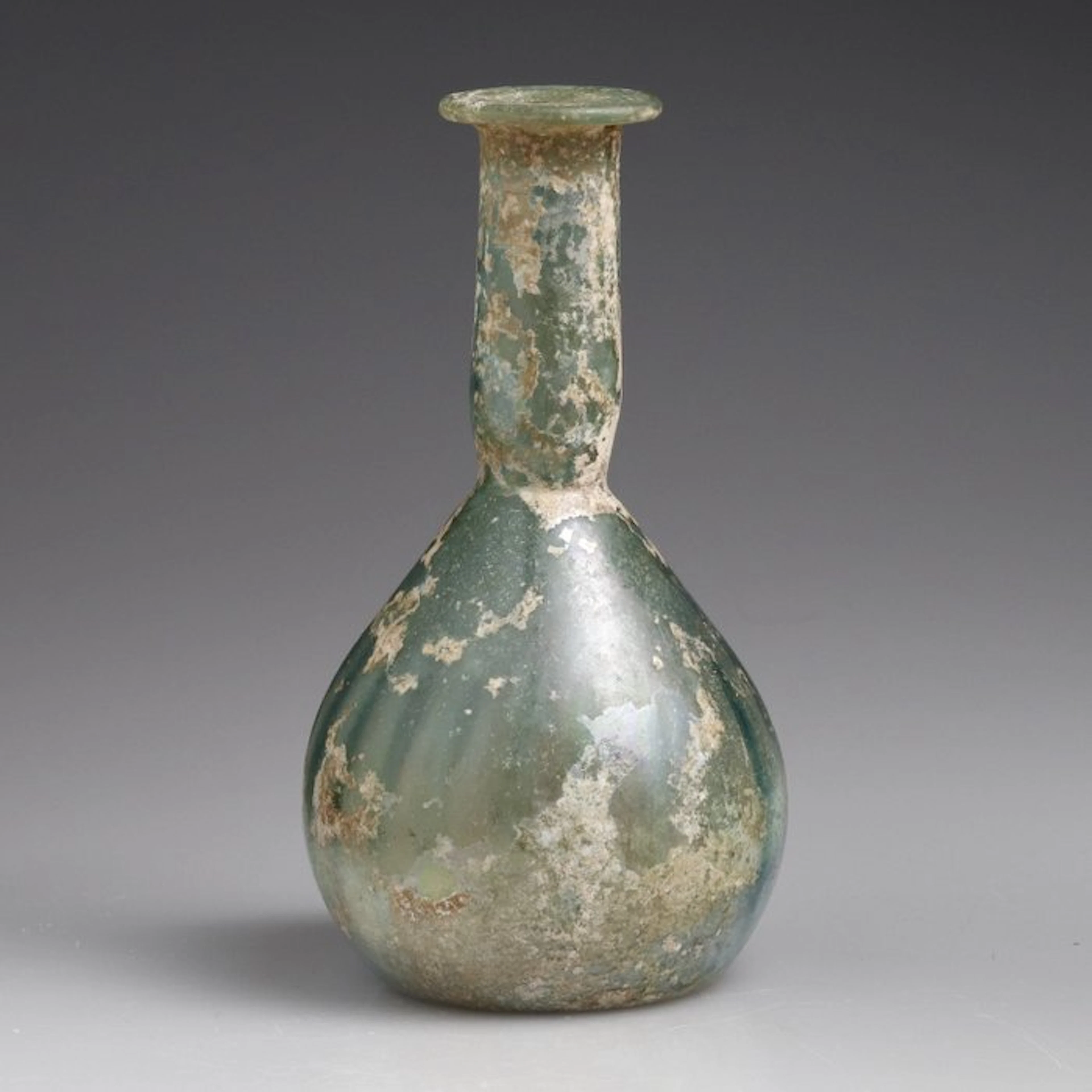 Ancient Roman, Empire Glass Decorated pear-shaped unguentarium. - 132 mm