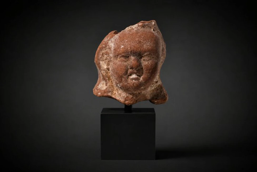Ancient Greek Eros terracotta head - 4.2 cm