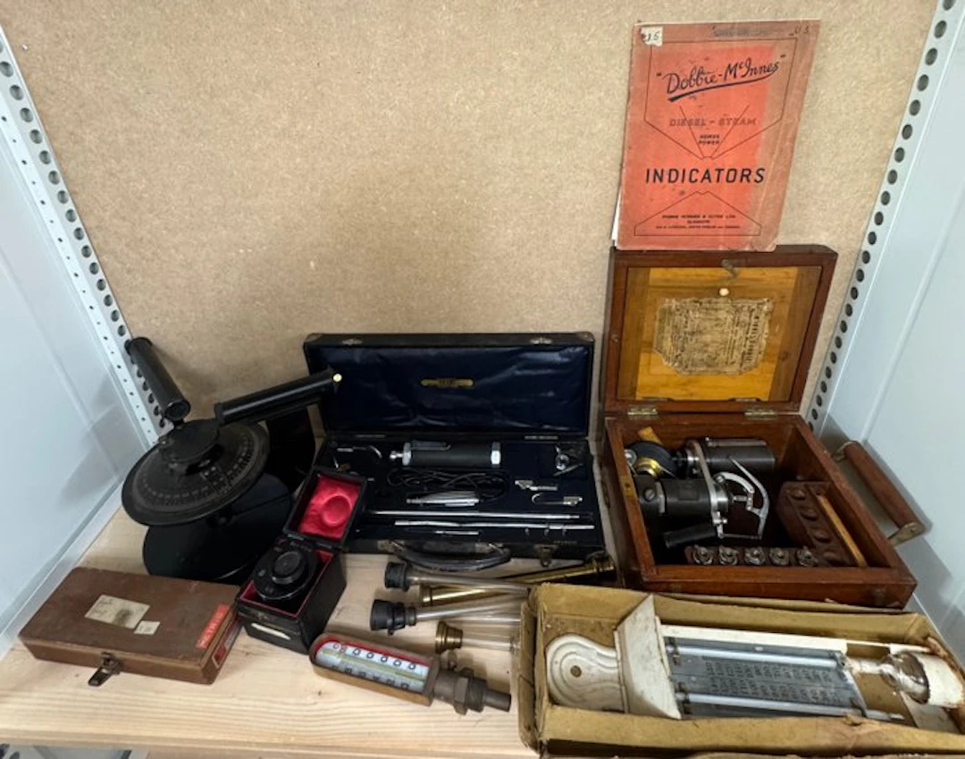 Collection of scientific instruments including steam engine indicator incl