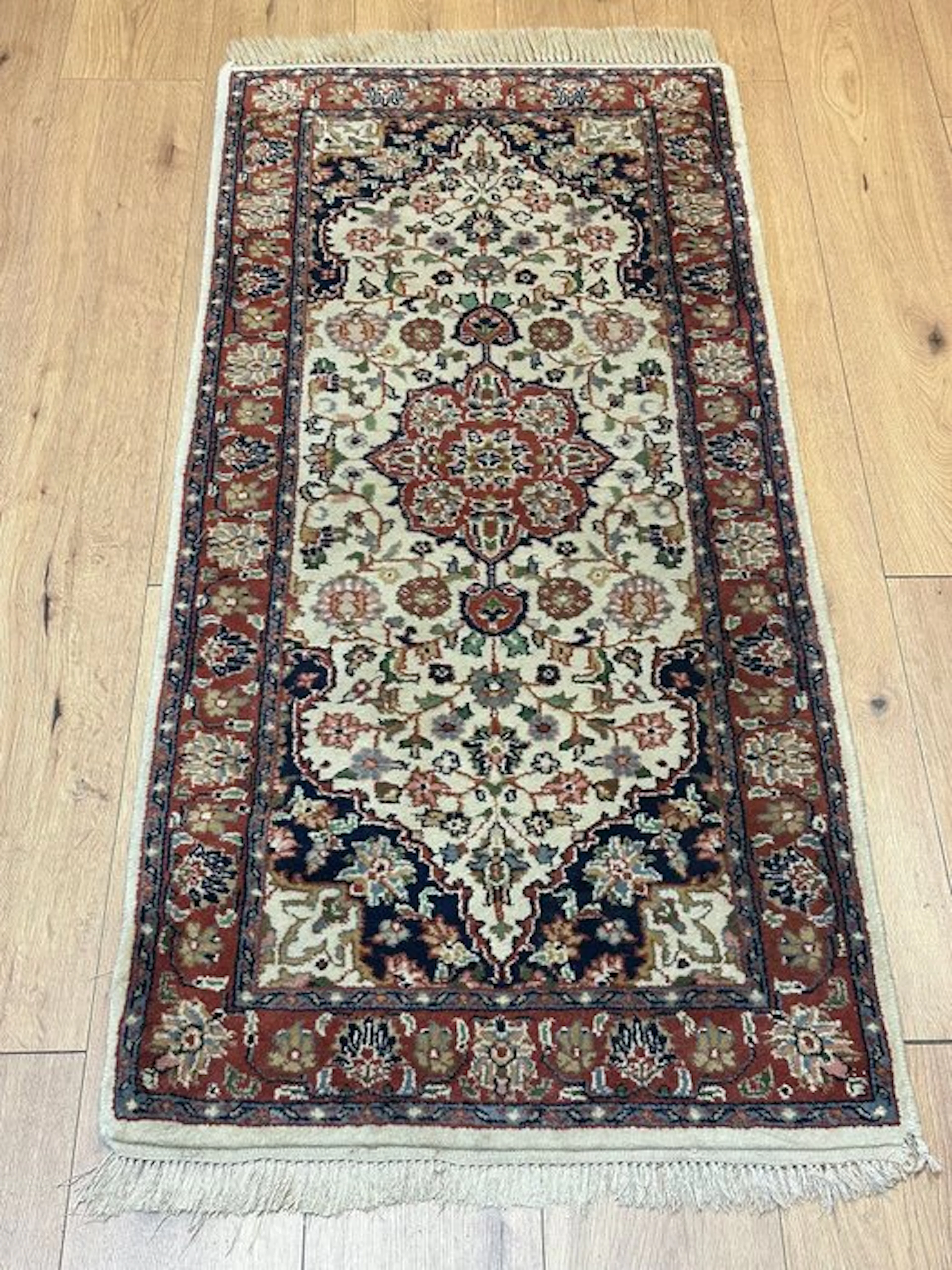 Classic Indian Tabriz rug runner with a delicate...