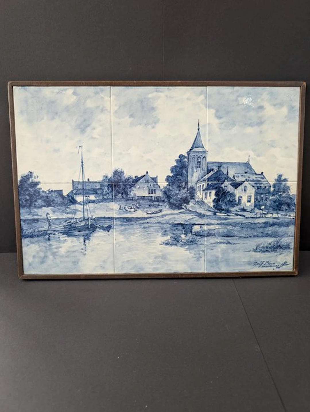 Tile - Delft blue tile panel of a church on the riverbank with a few boats