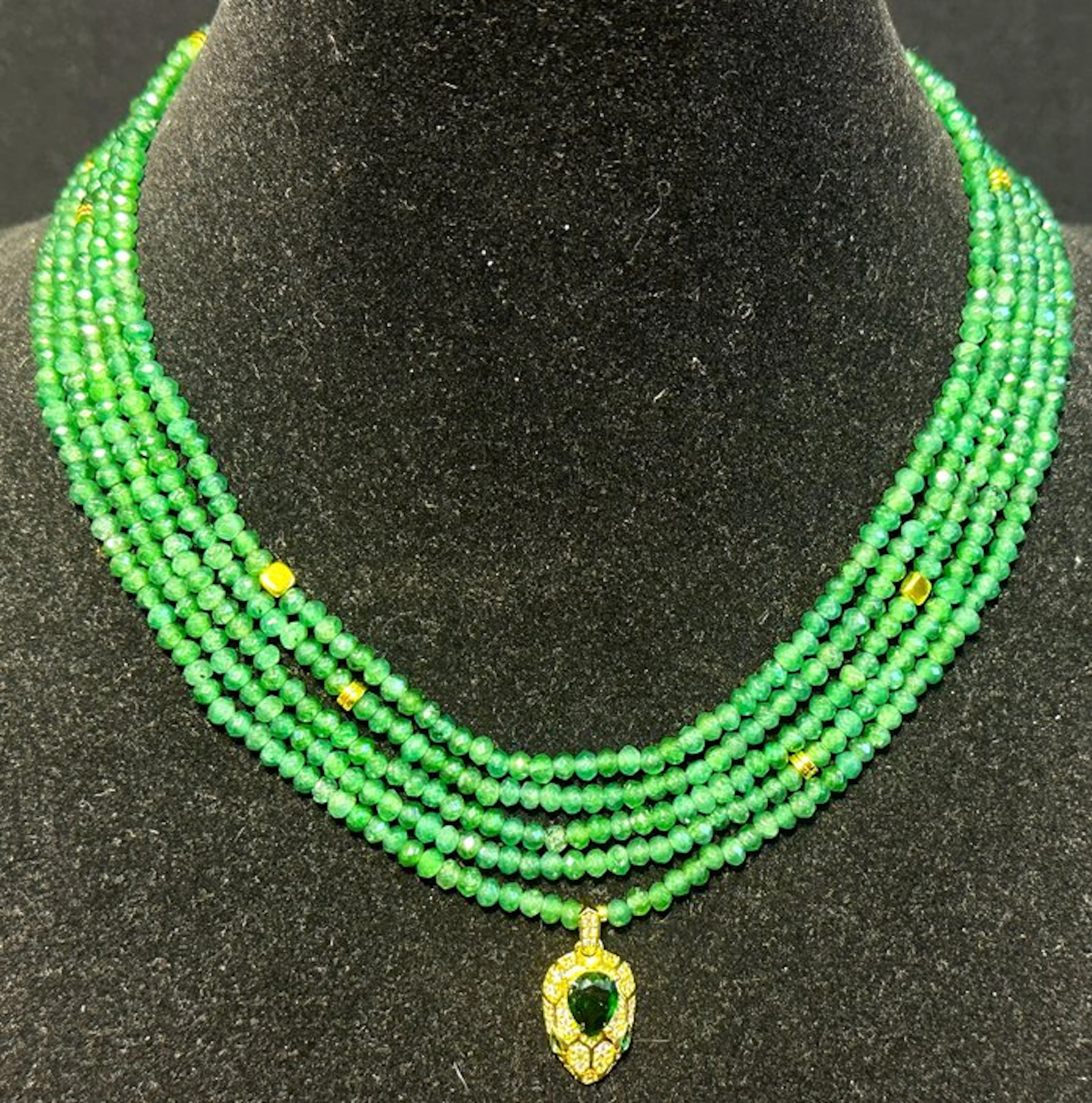 Natural emerald from Brazil with a green cubic zirconia pendant