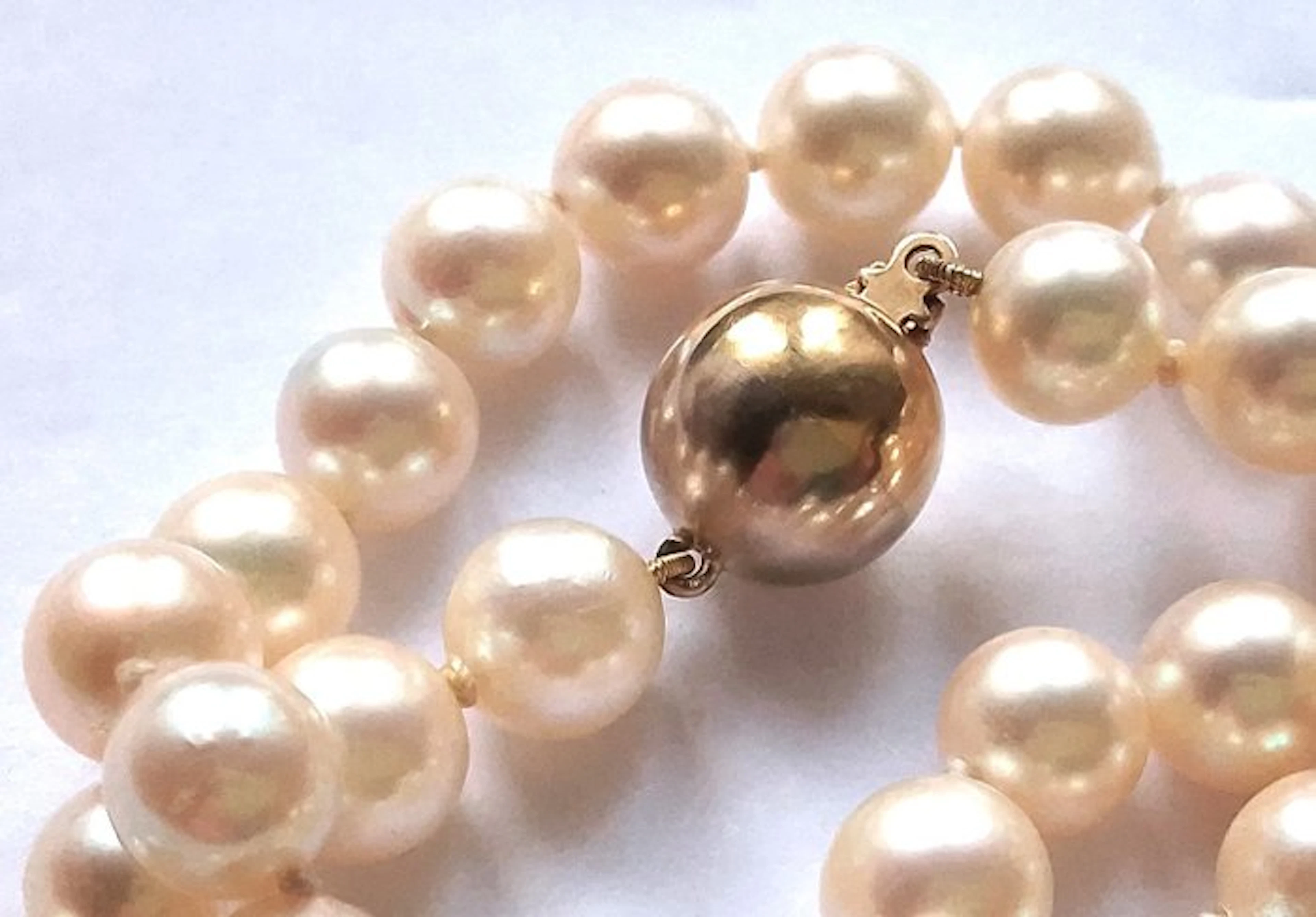 String of beads 14 kt yellow gold / white gold - uniform...
