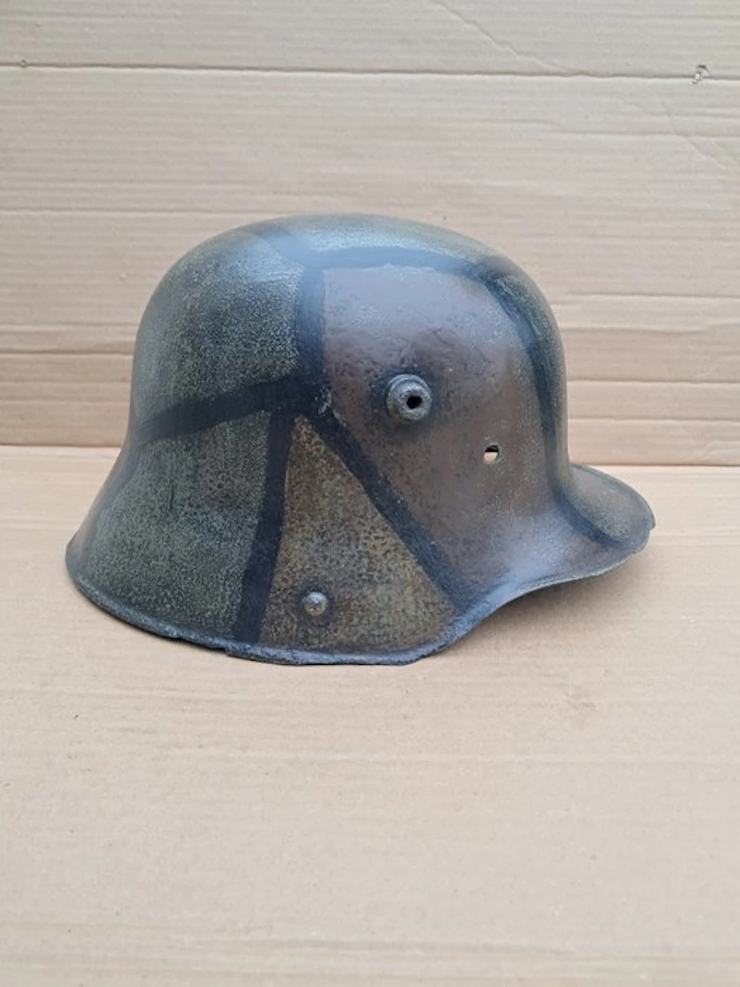 Original German M1916 helmet with reproduced camouflage. - Military helmet