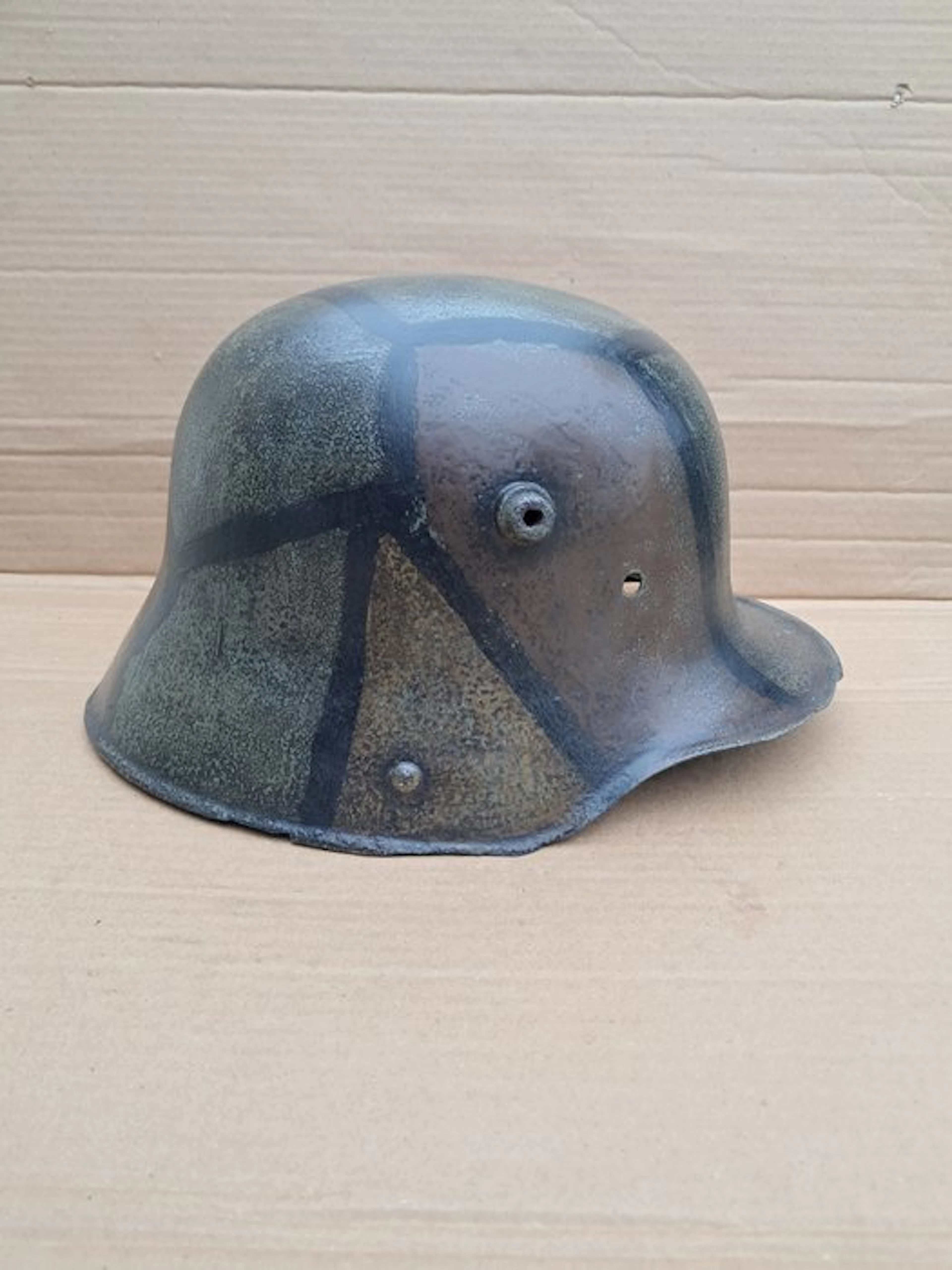 Original German M1916 helmet with reproduced camouflage. - Military helmet