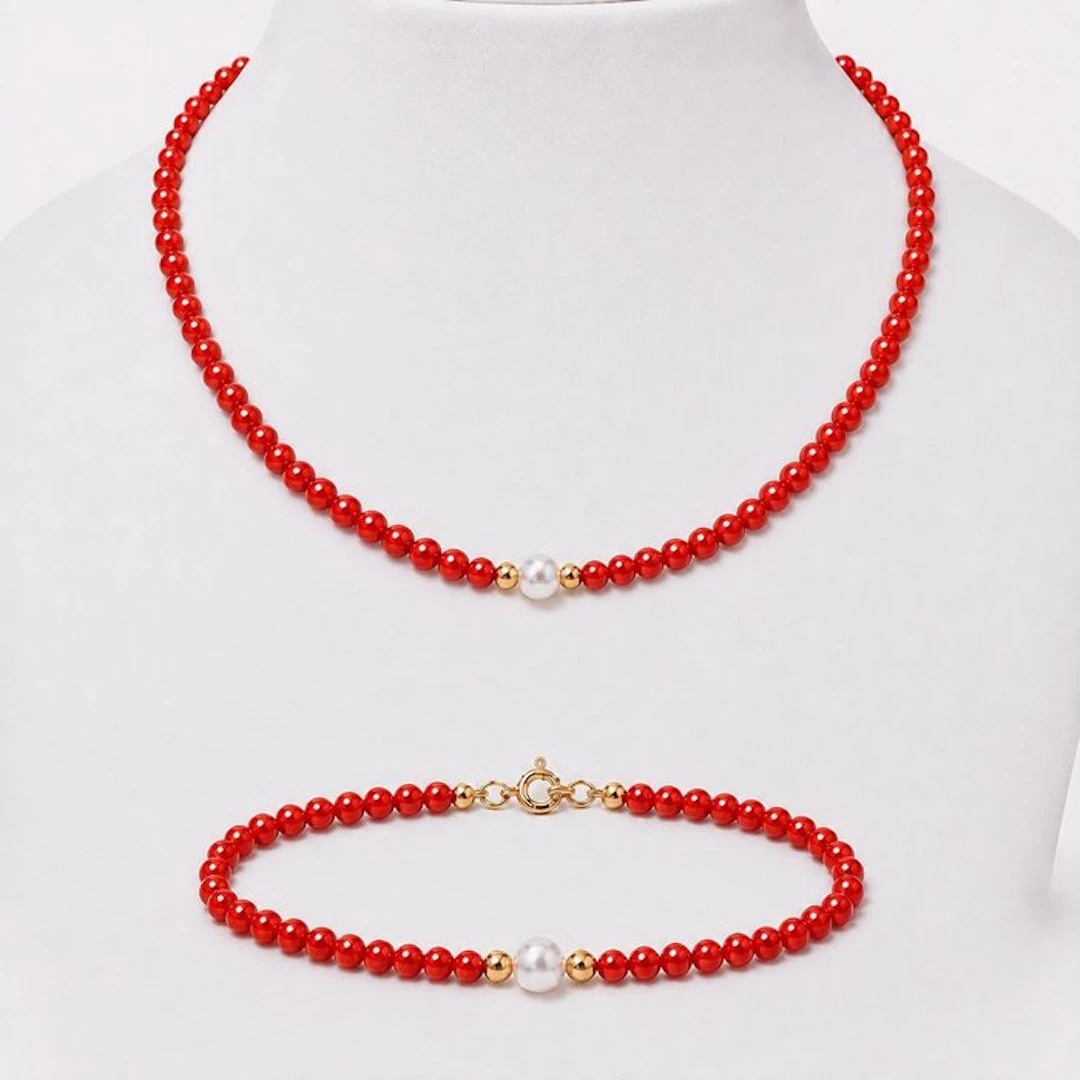 No reserve price - 2 piece jewellery set - 18 kt. Yellow gold Coral
