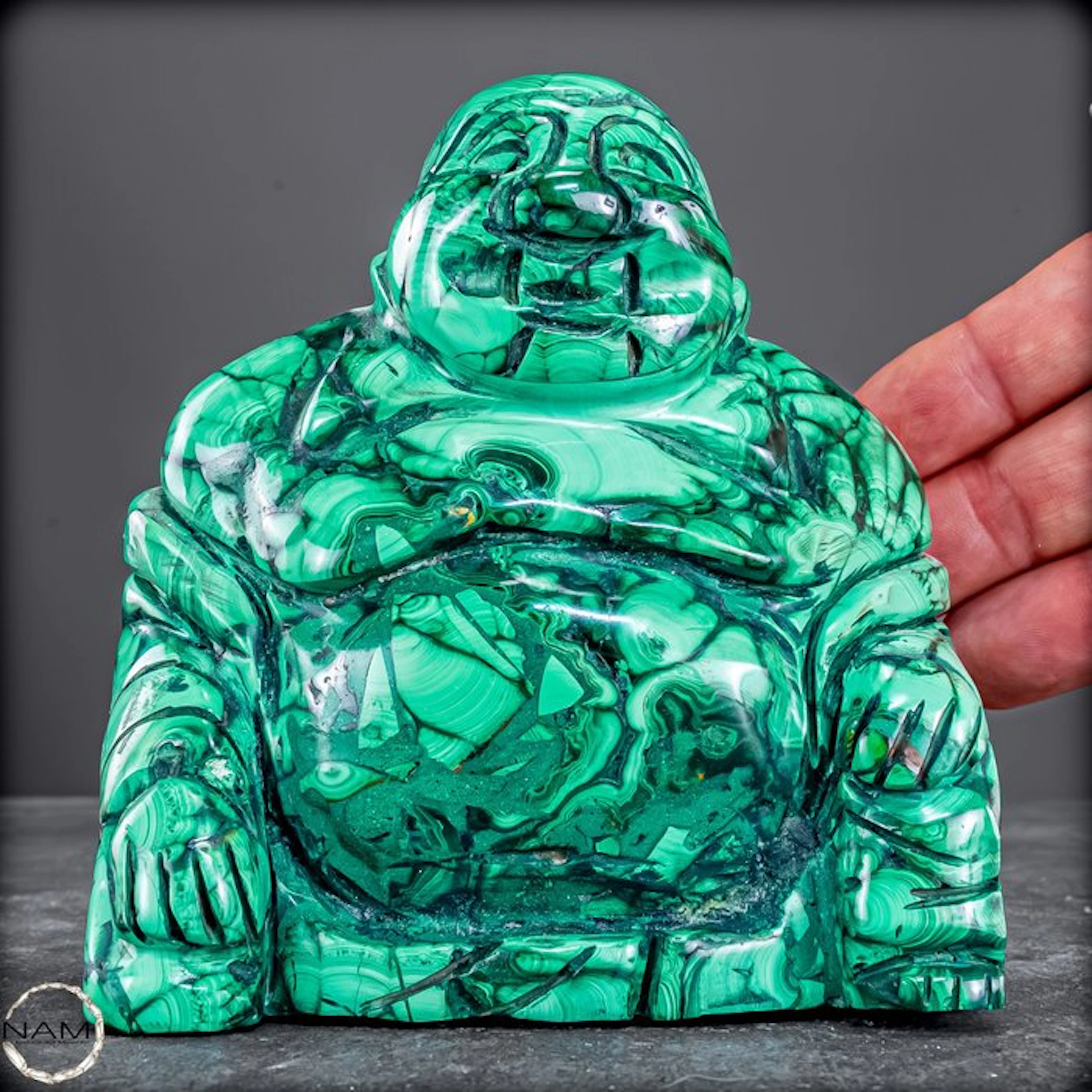 Malachite Buddha sculpture weighing 1.1 kg in exceptional top quality