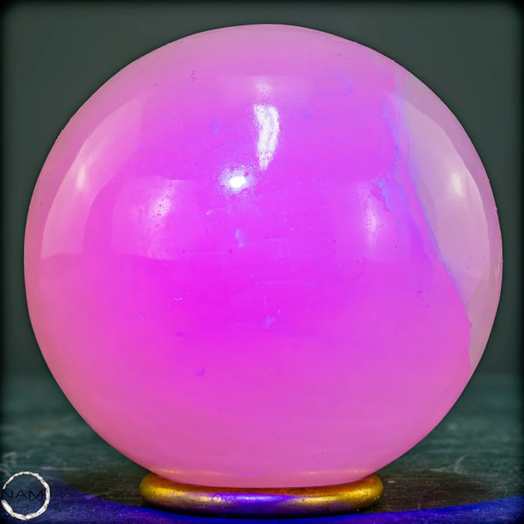 Natural aragonite sphere in soft pink with intense UV fluorescence- 807.74 g