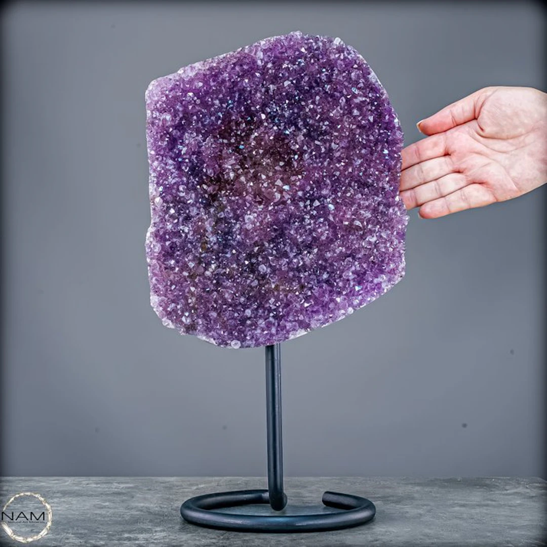 Radiant amethyst on a metal stand – elegance in violet splendor