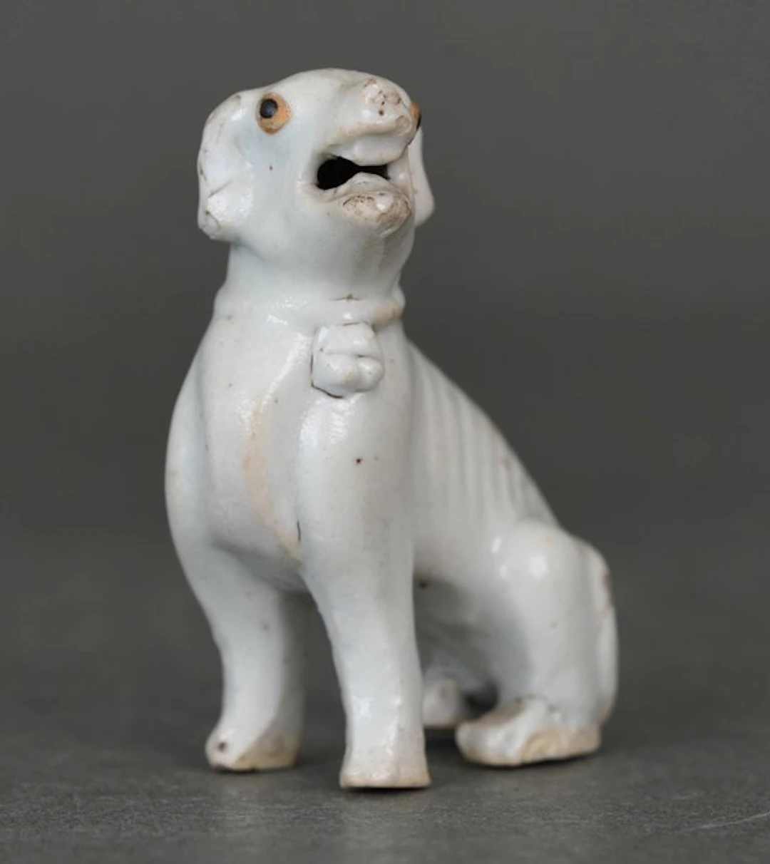 Qingbai Glazed - Seated Hound or Dog With Black Oxide...