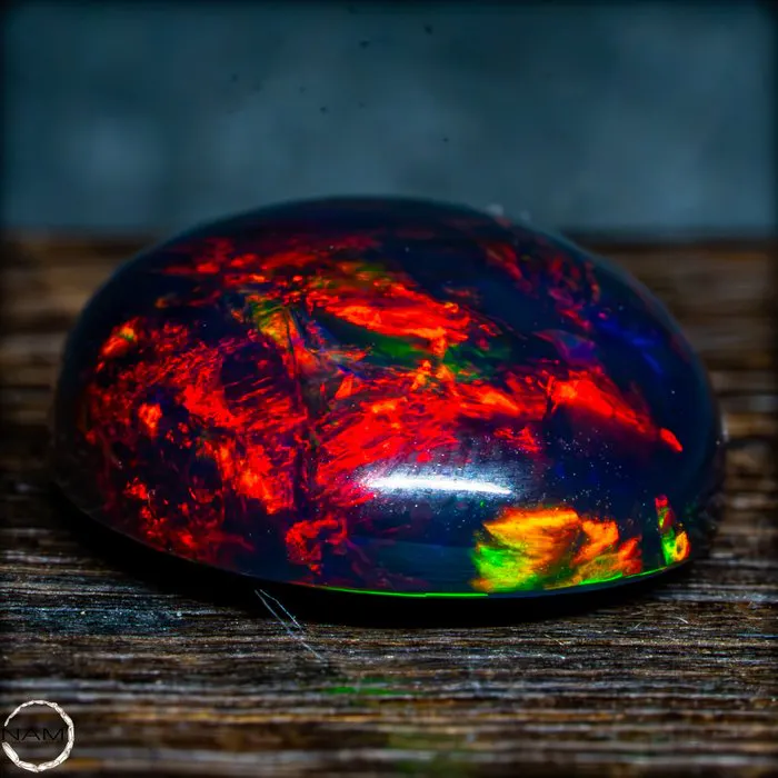 The finest Black Opal in glowing rainbow colors—a...