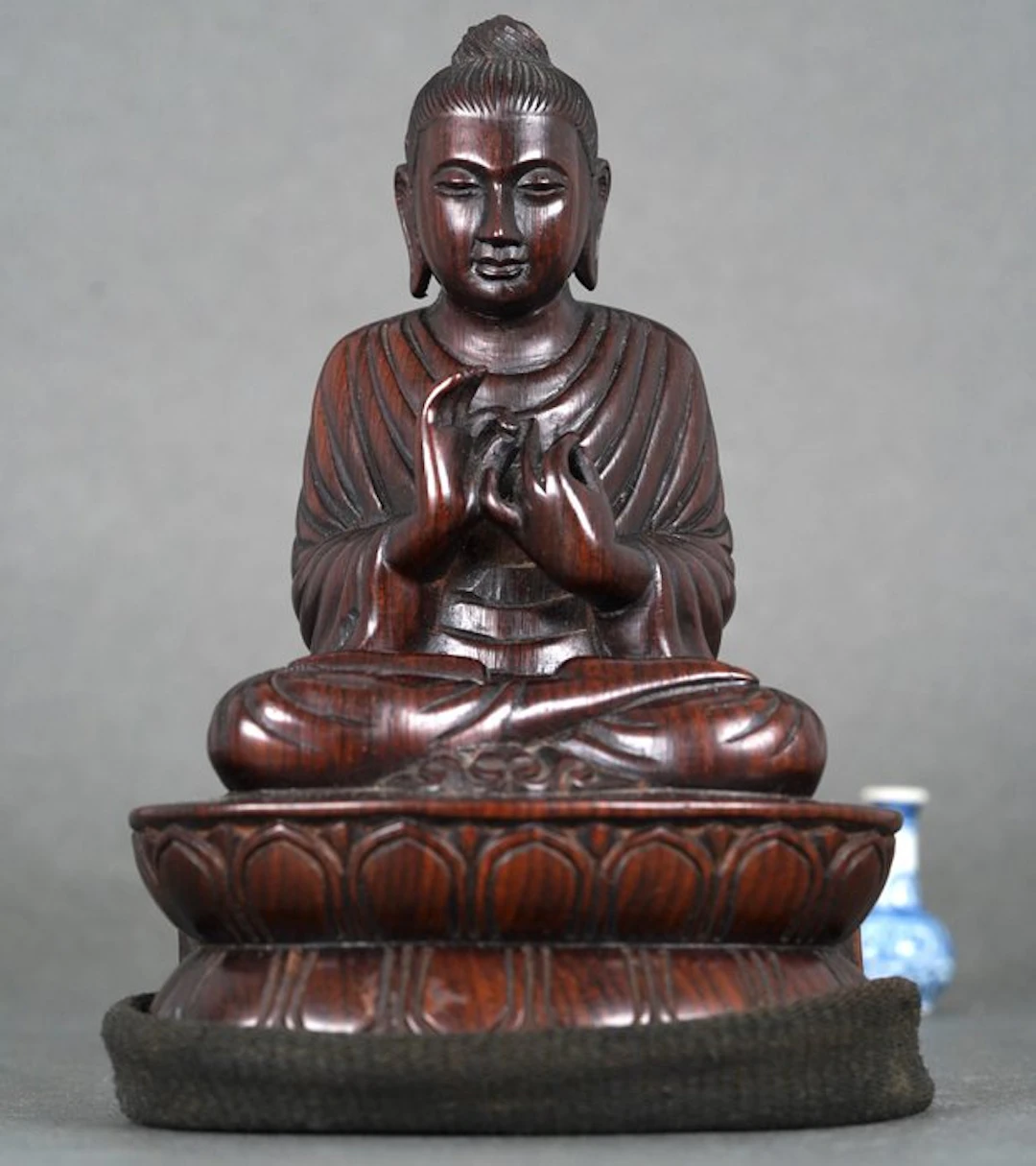 Seated Buddha with Long Gown Devotional sculpture - Wood - Asia