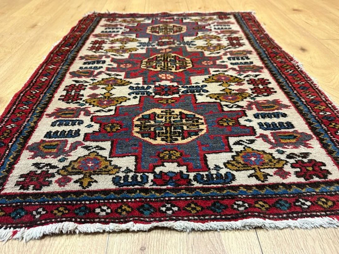Beautiful antique Kazakh Derbend rug with a traditional geometric pattern