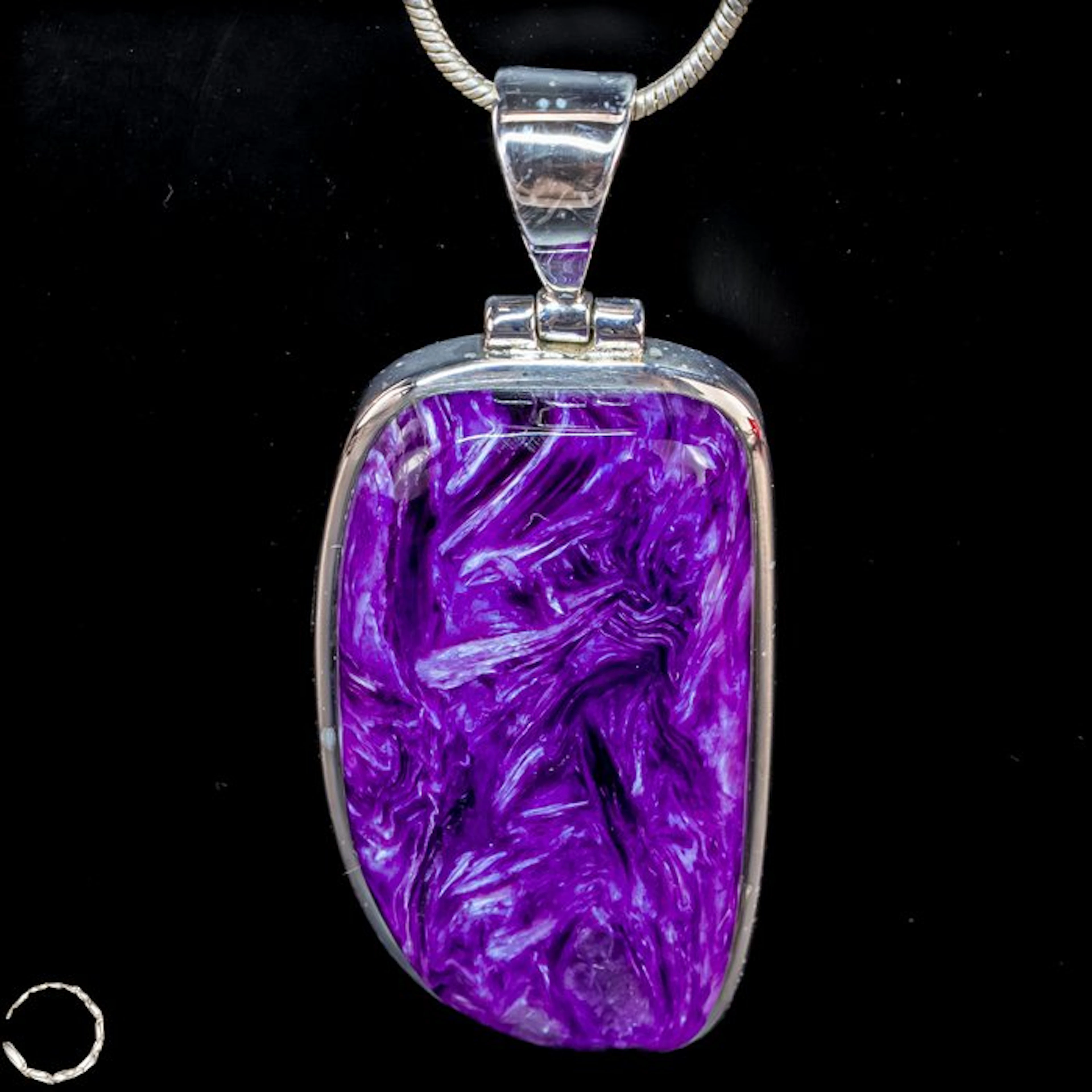 An extraordinary pendant made of high-quality charoite 51.85 ct- 10.37 g